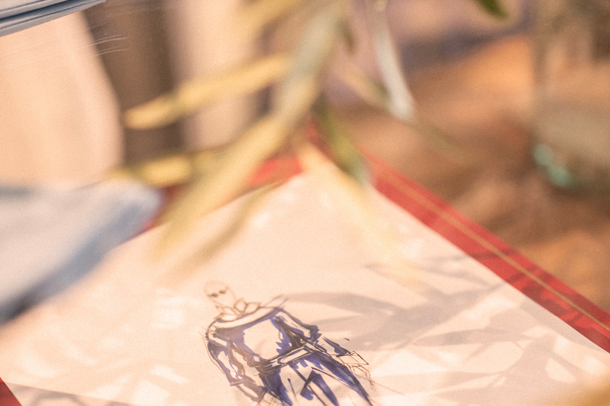 a drawing of a man on a paper