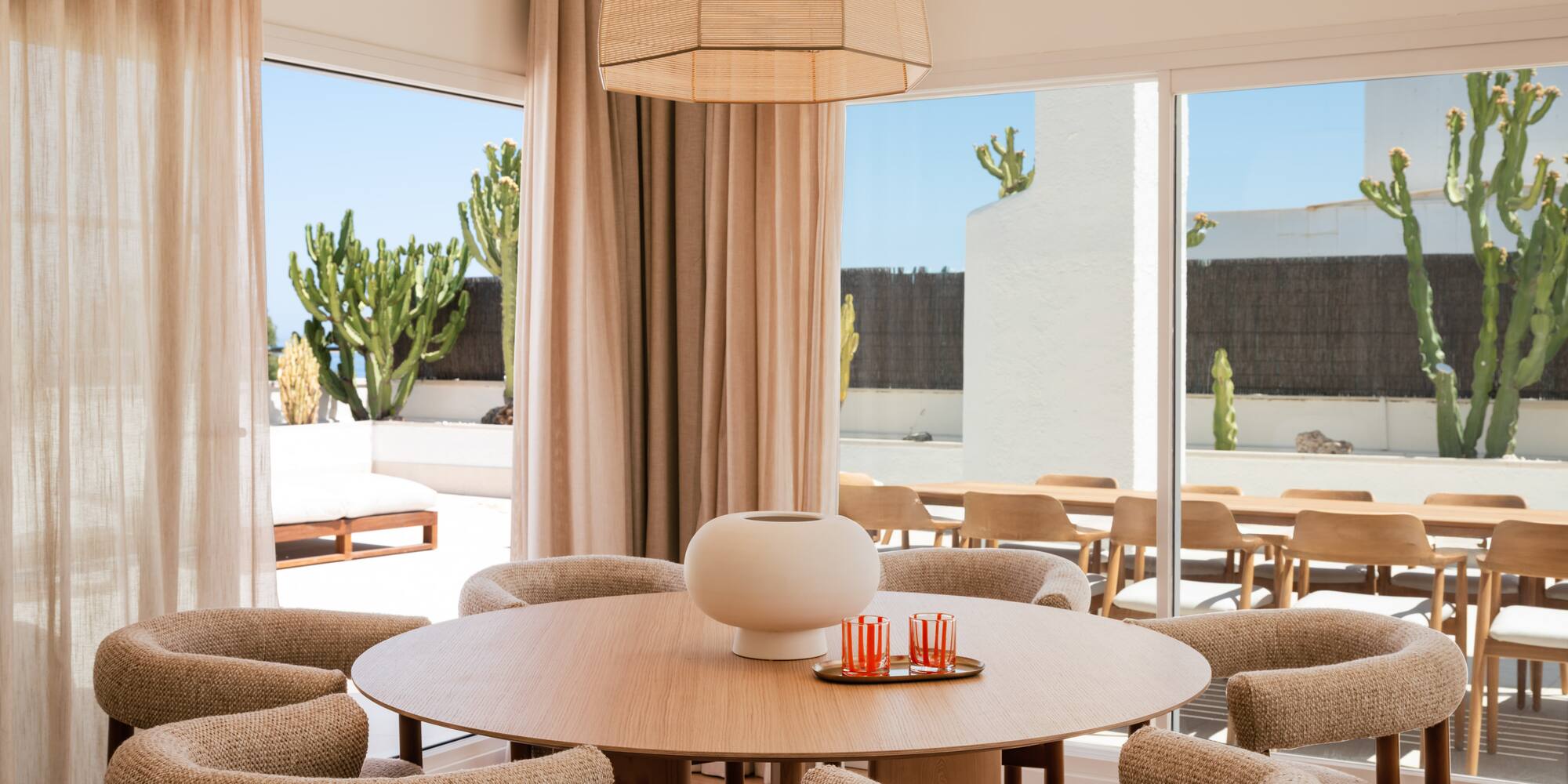 a room with a table and chairs