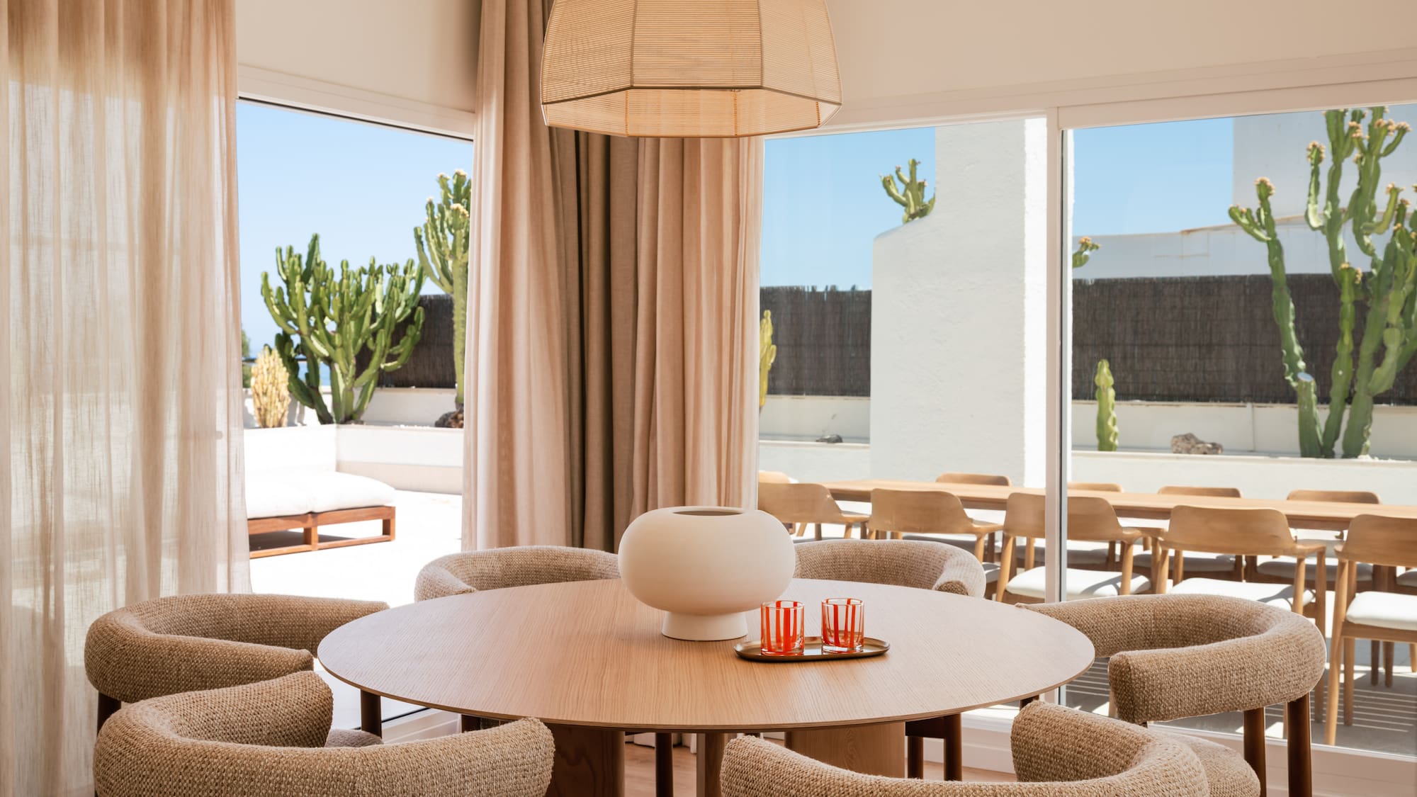 a room with a table and chairs