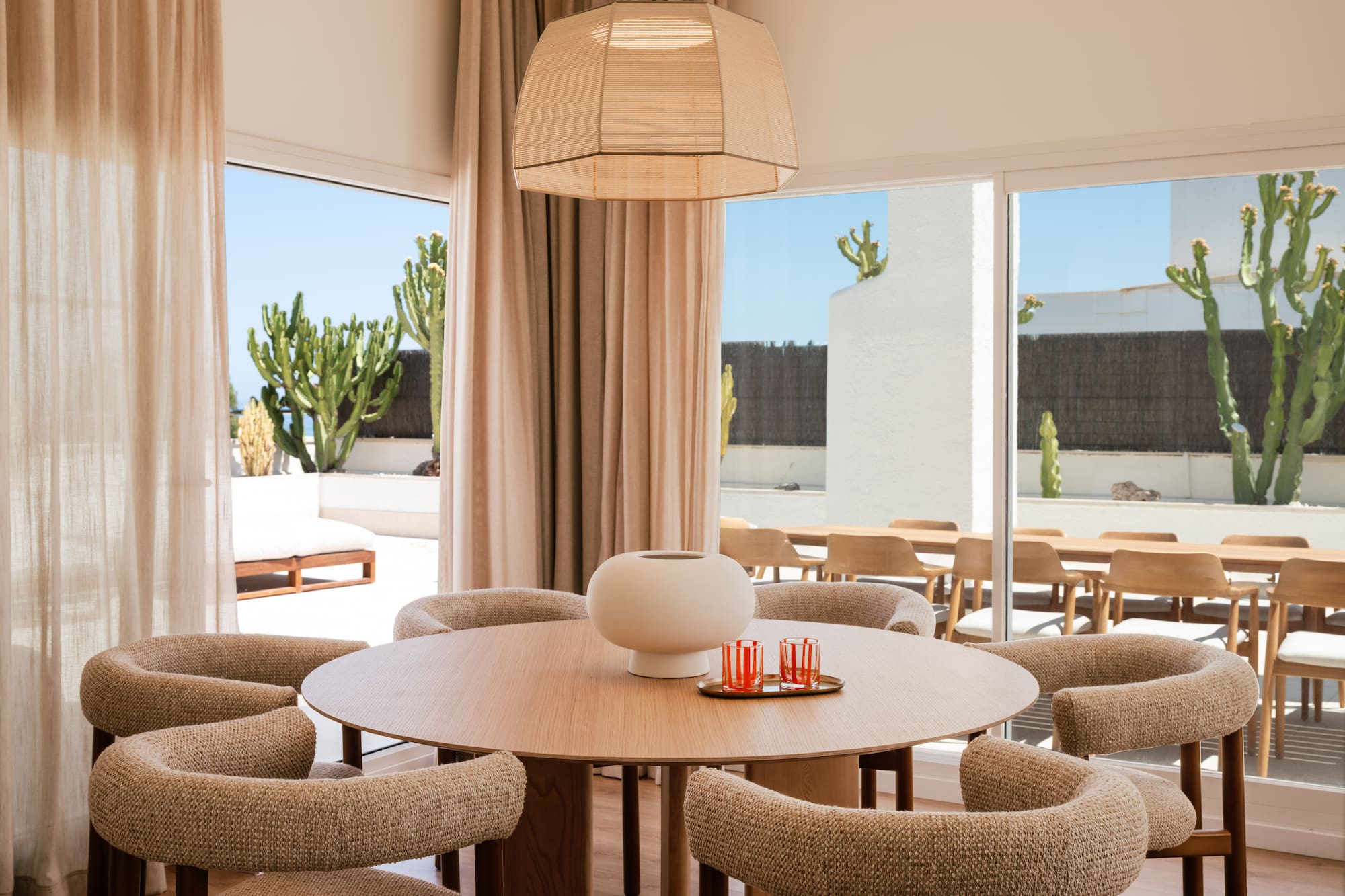 a room with a table and chairs