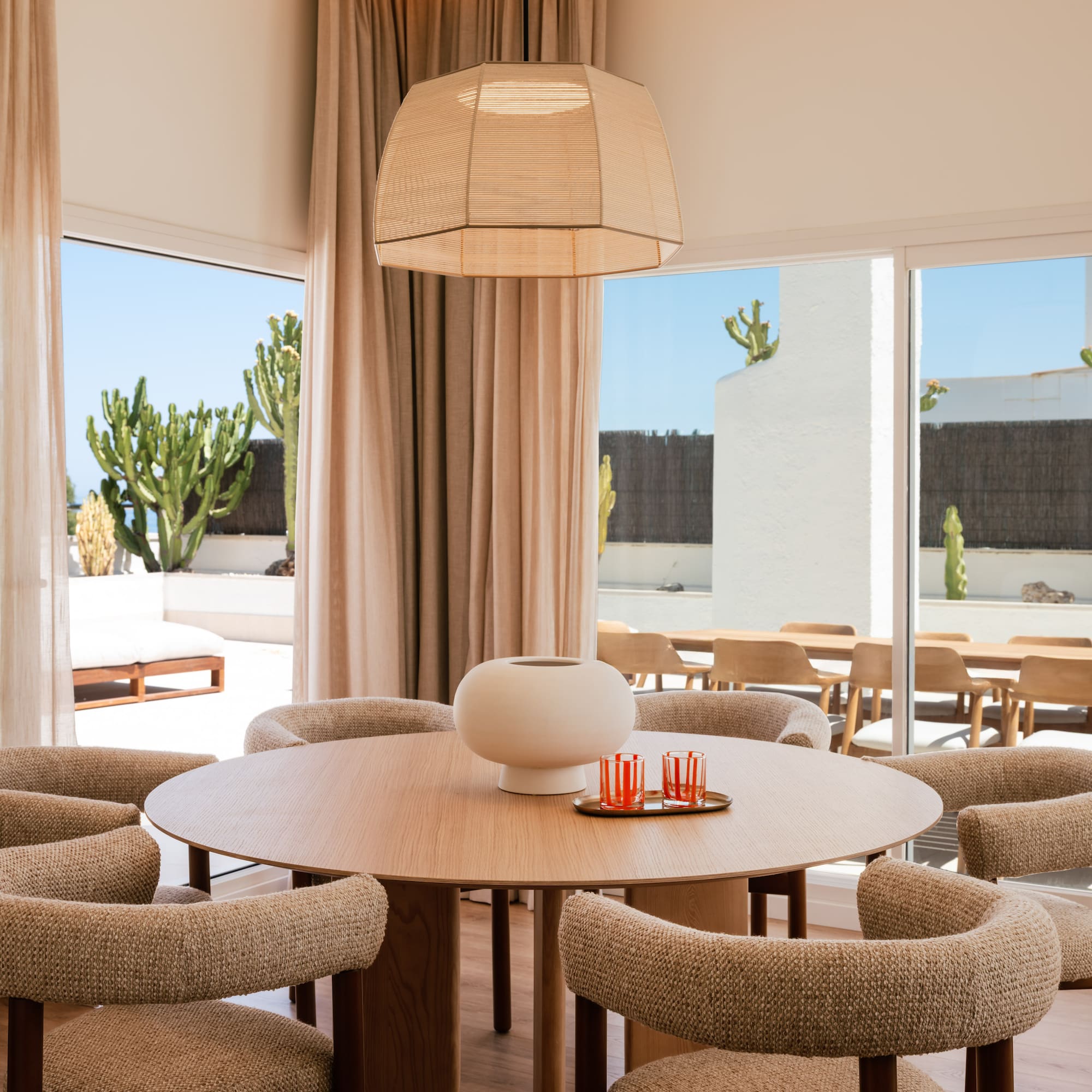 a room with a table and chairs