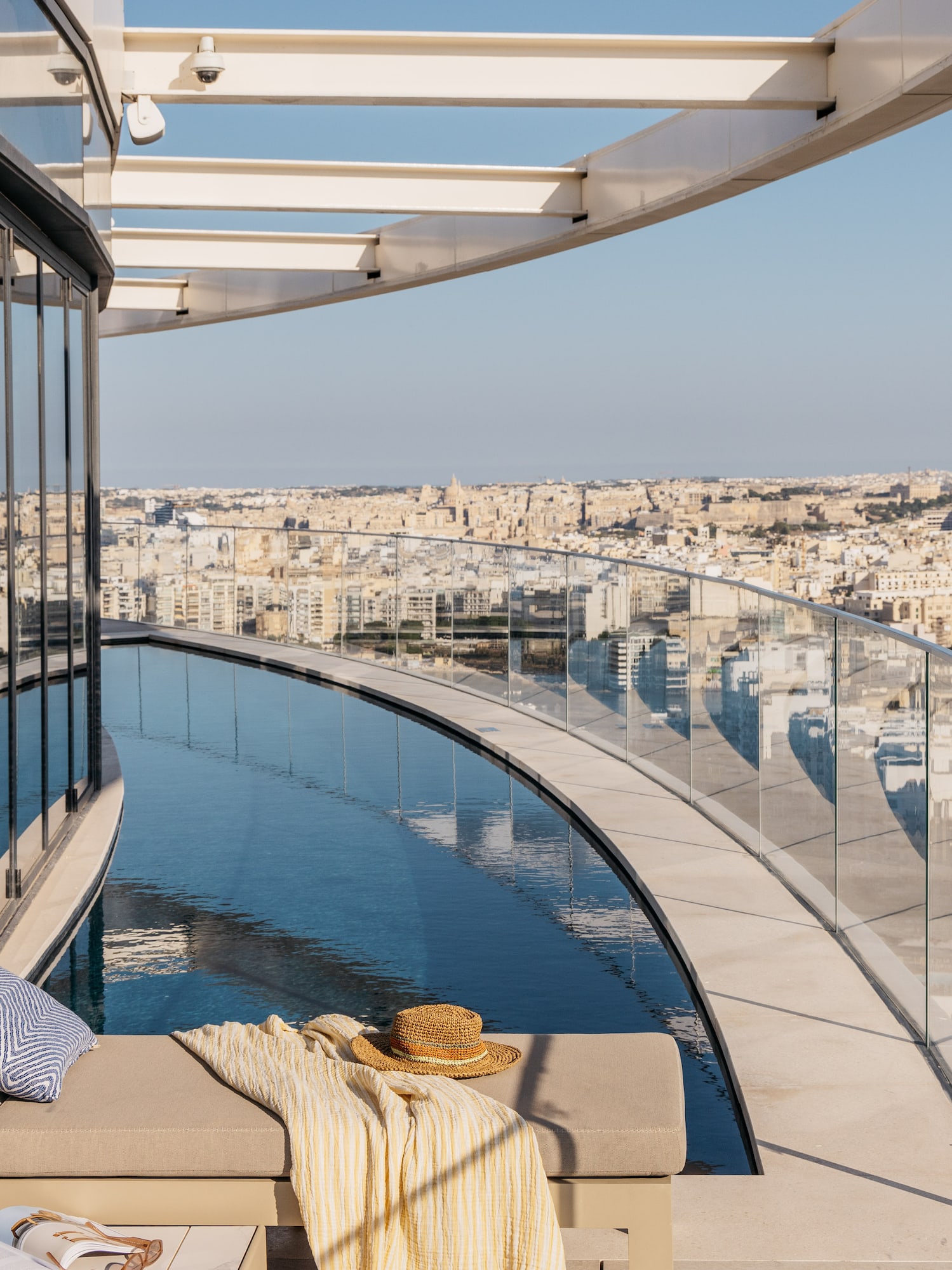 a pool with a view of a city