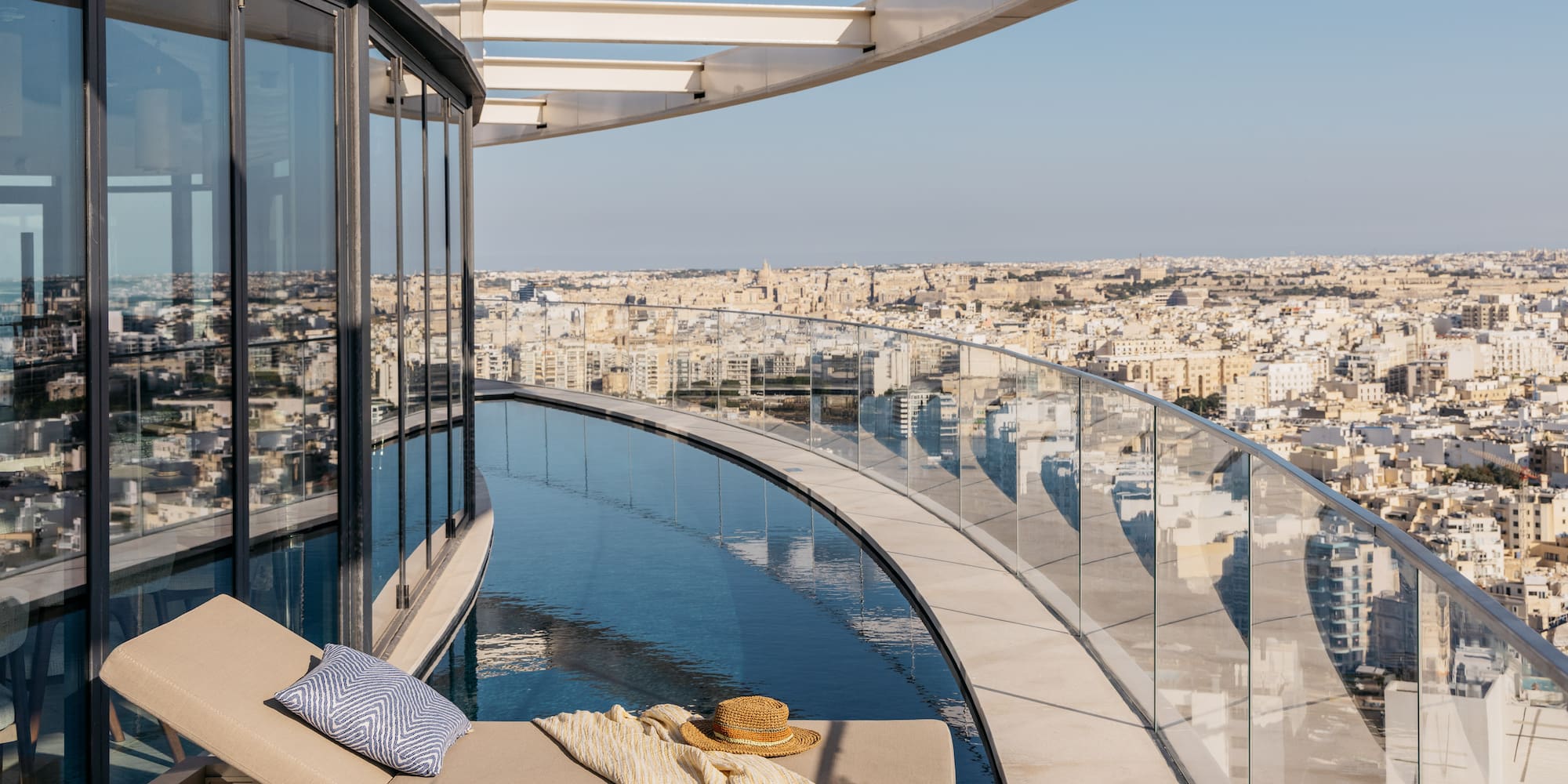 a pool with a view of a city