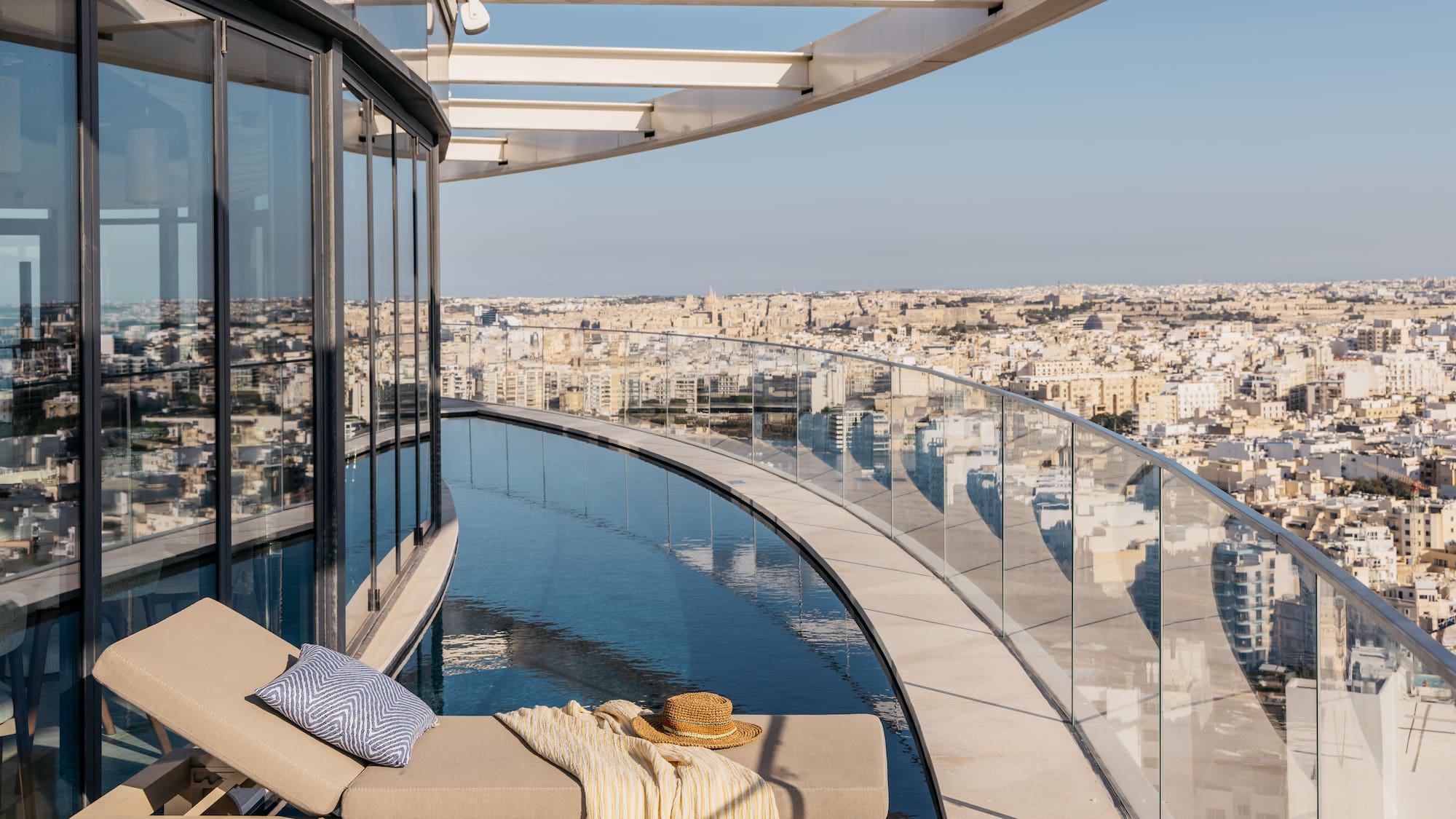 a pool with a view of a city