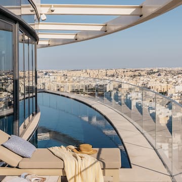 a pool with a view of a city