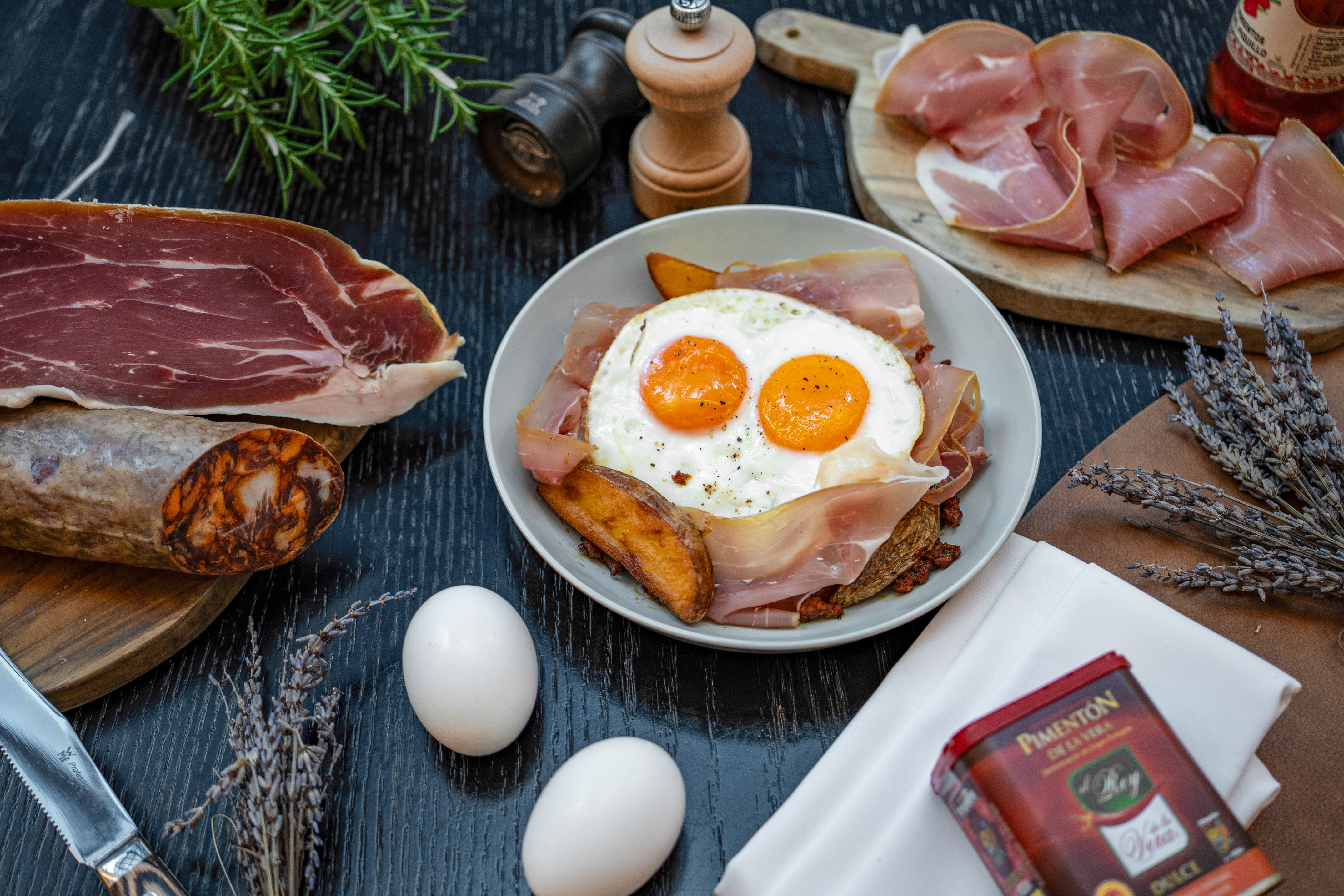 Huevos rotos with jamon, chorizo, potatoes, and Pimentón de la Vera.