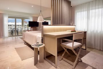 a room with a bed and a table