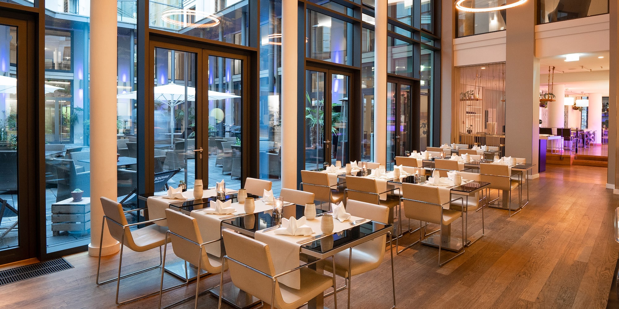 a room with tables and chairs