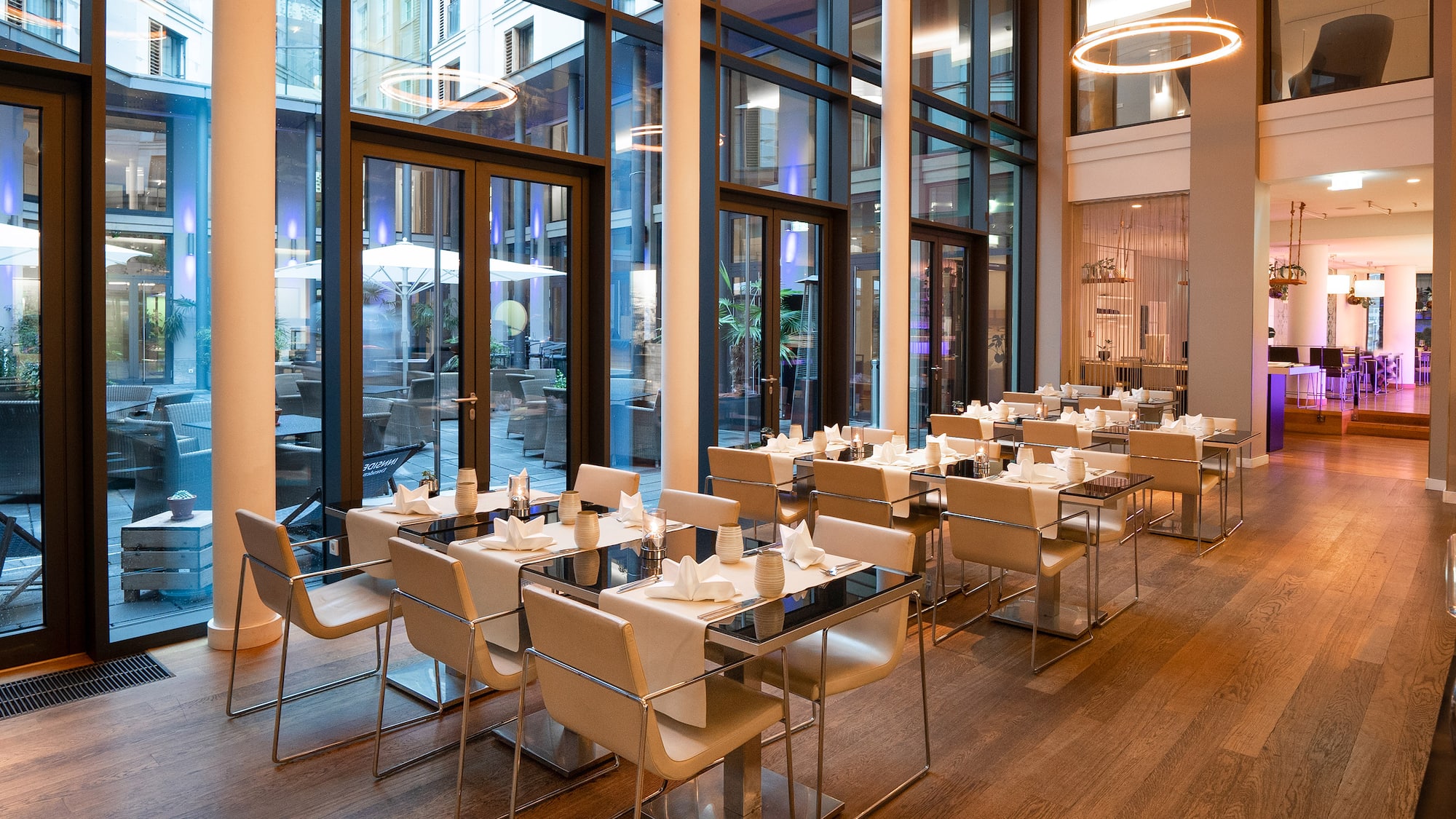 a room with tables and chairs