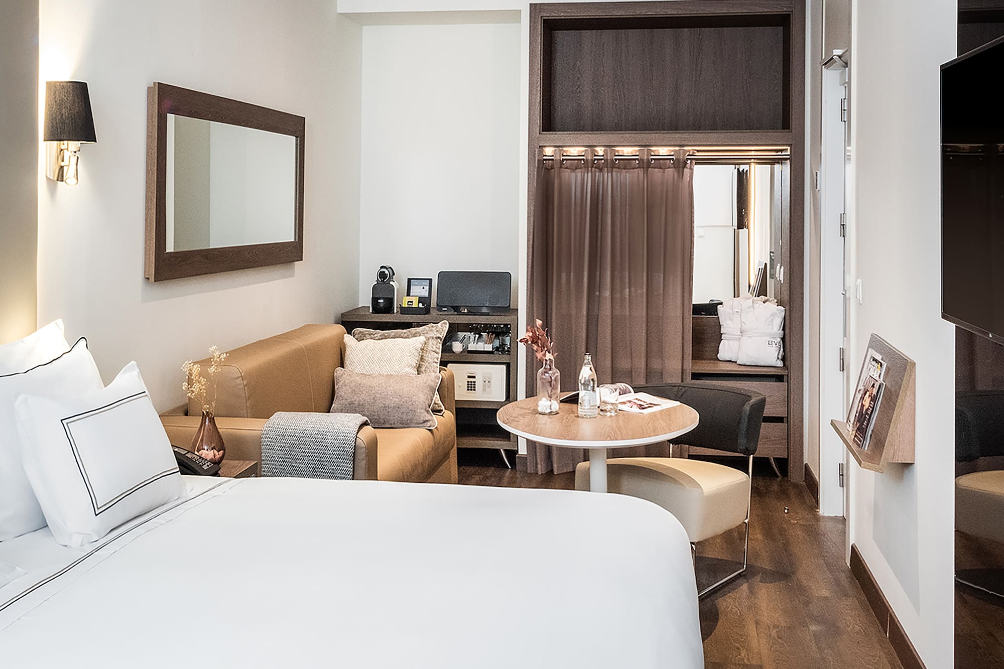 a room with a bed and a table