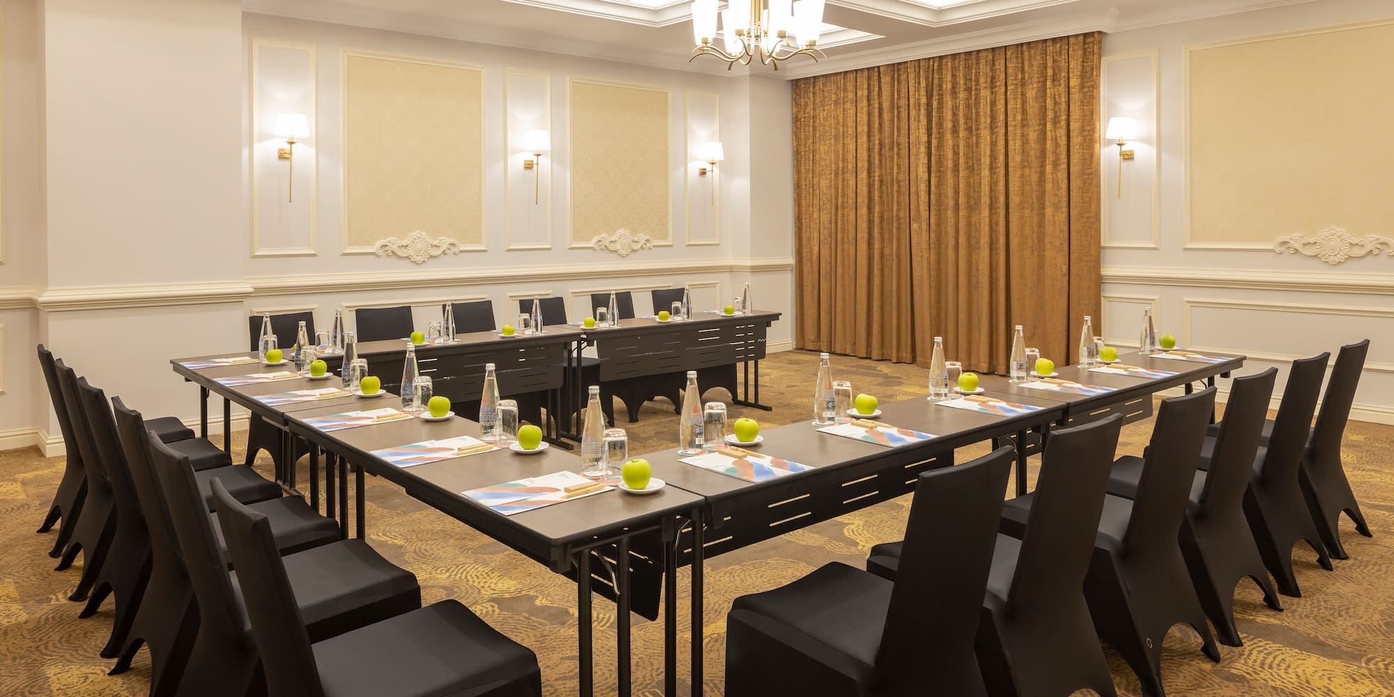 a room with a table and chairs