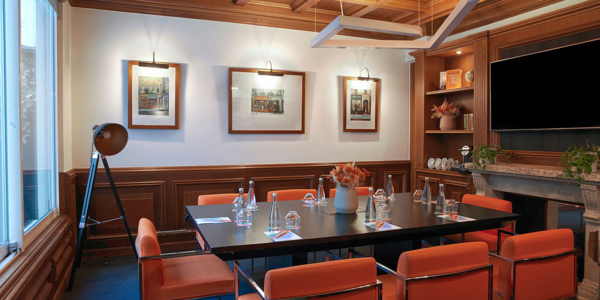 a room with a table and chairs