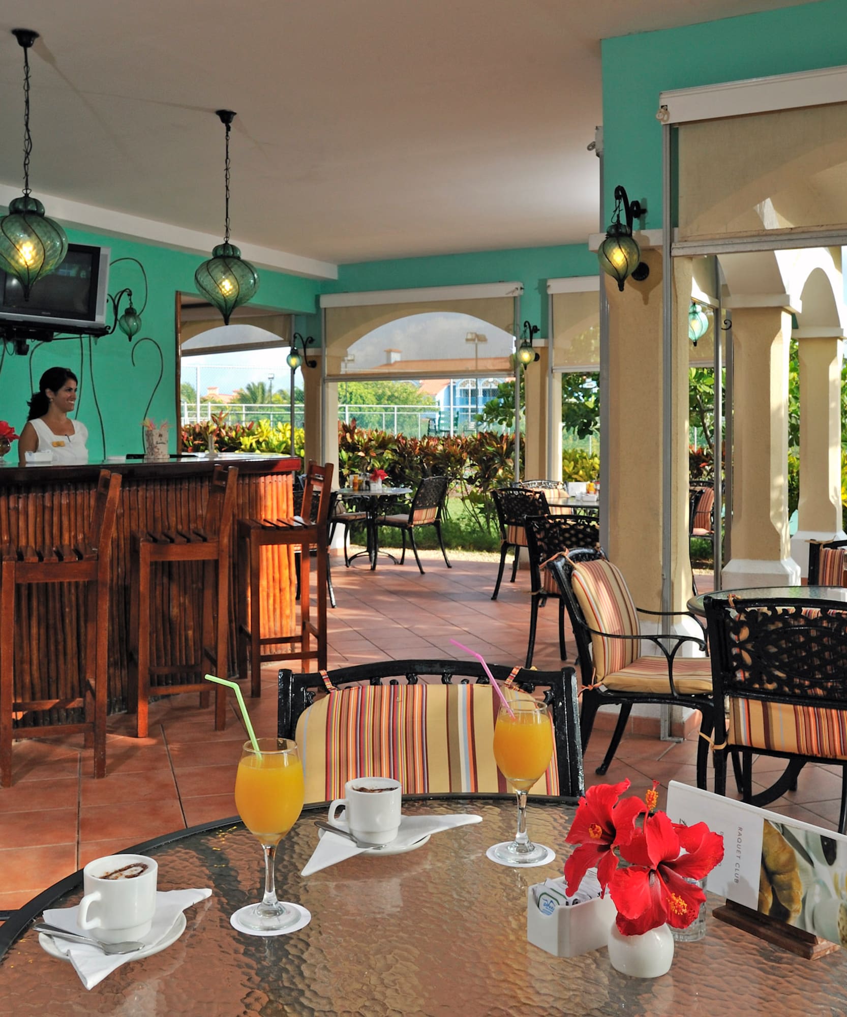 a restaurant with tables and chairs