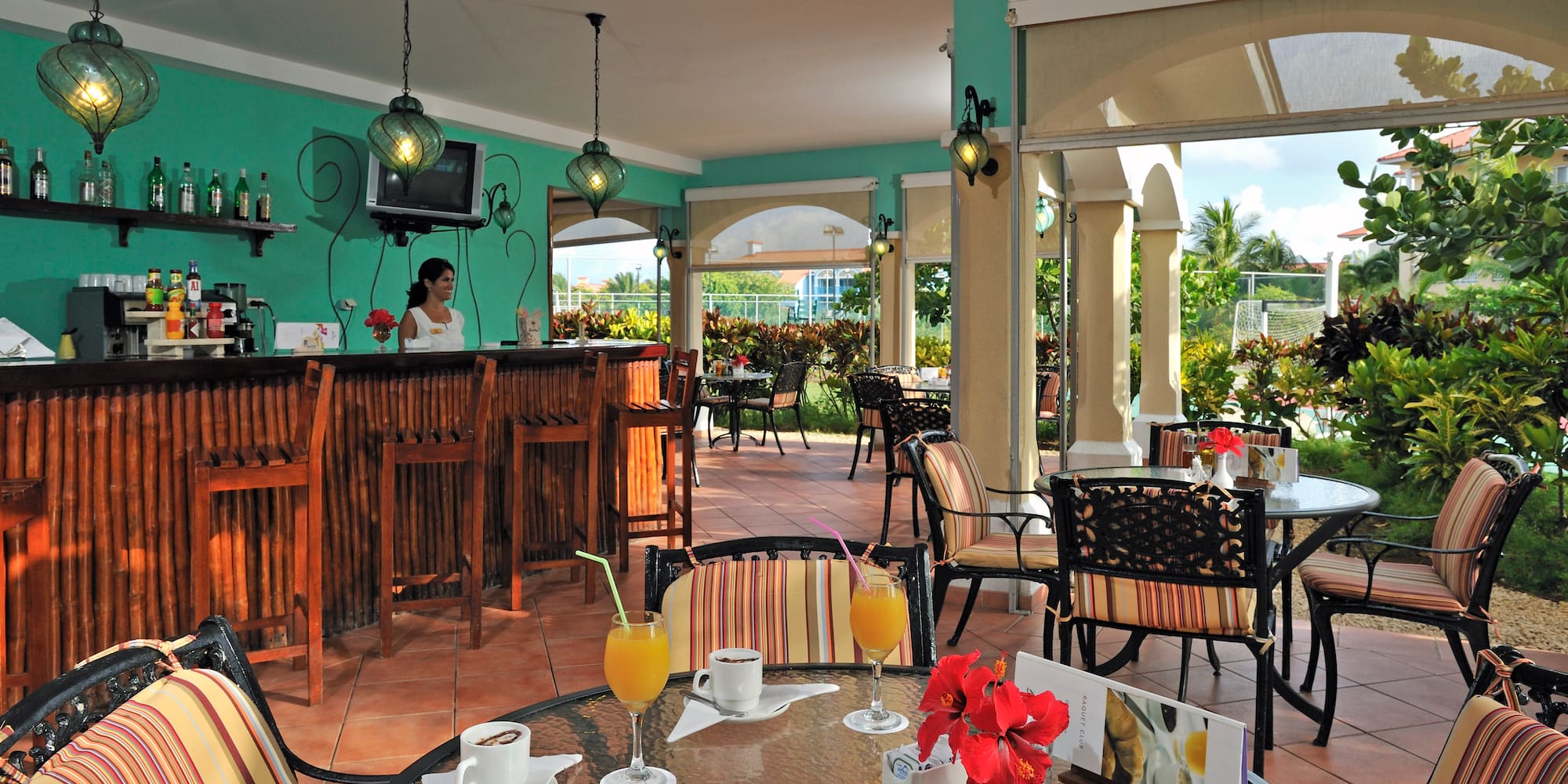 a restaurant with tables and chairs
