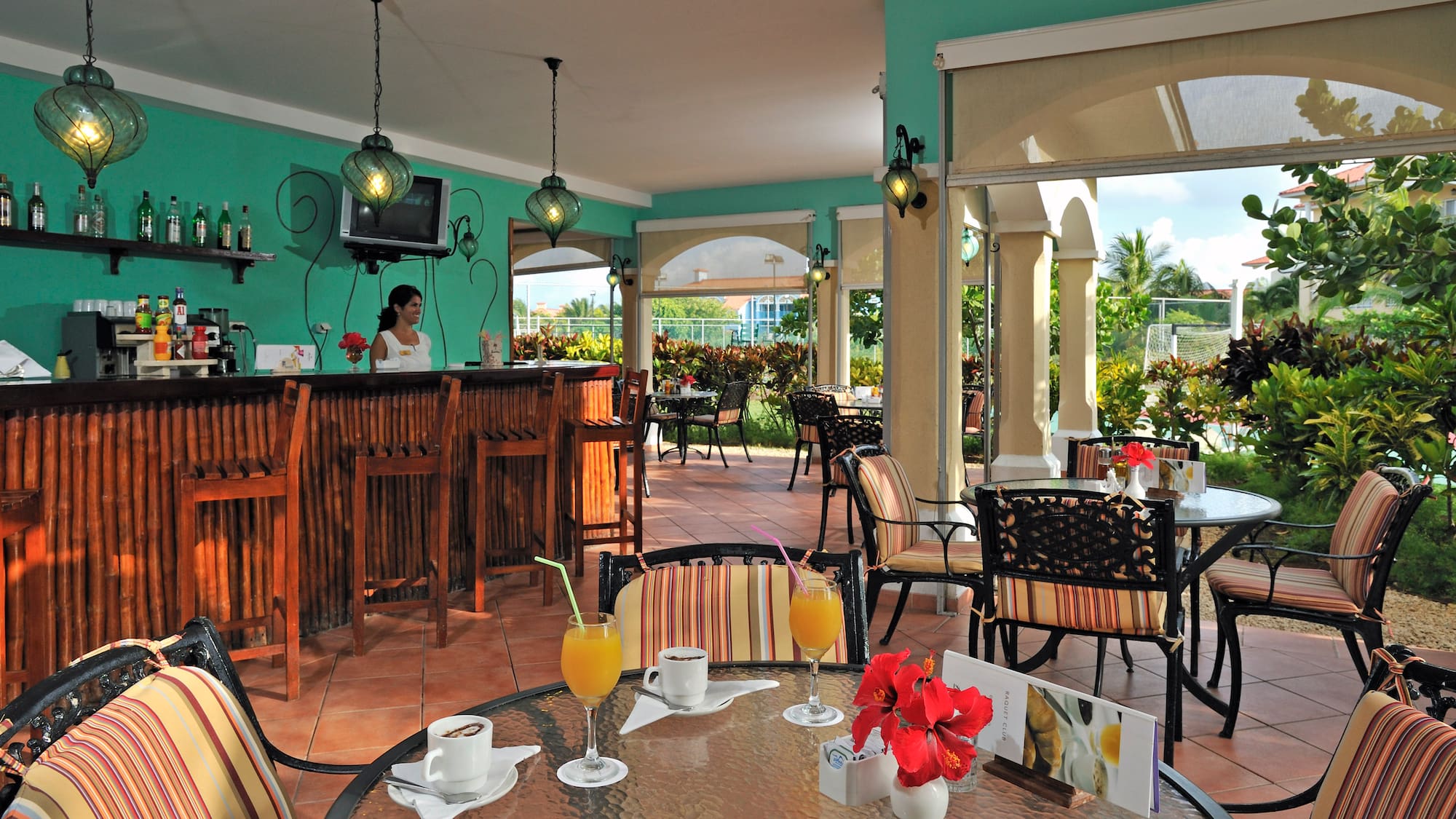 a restaurant with tables and chairs