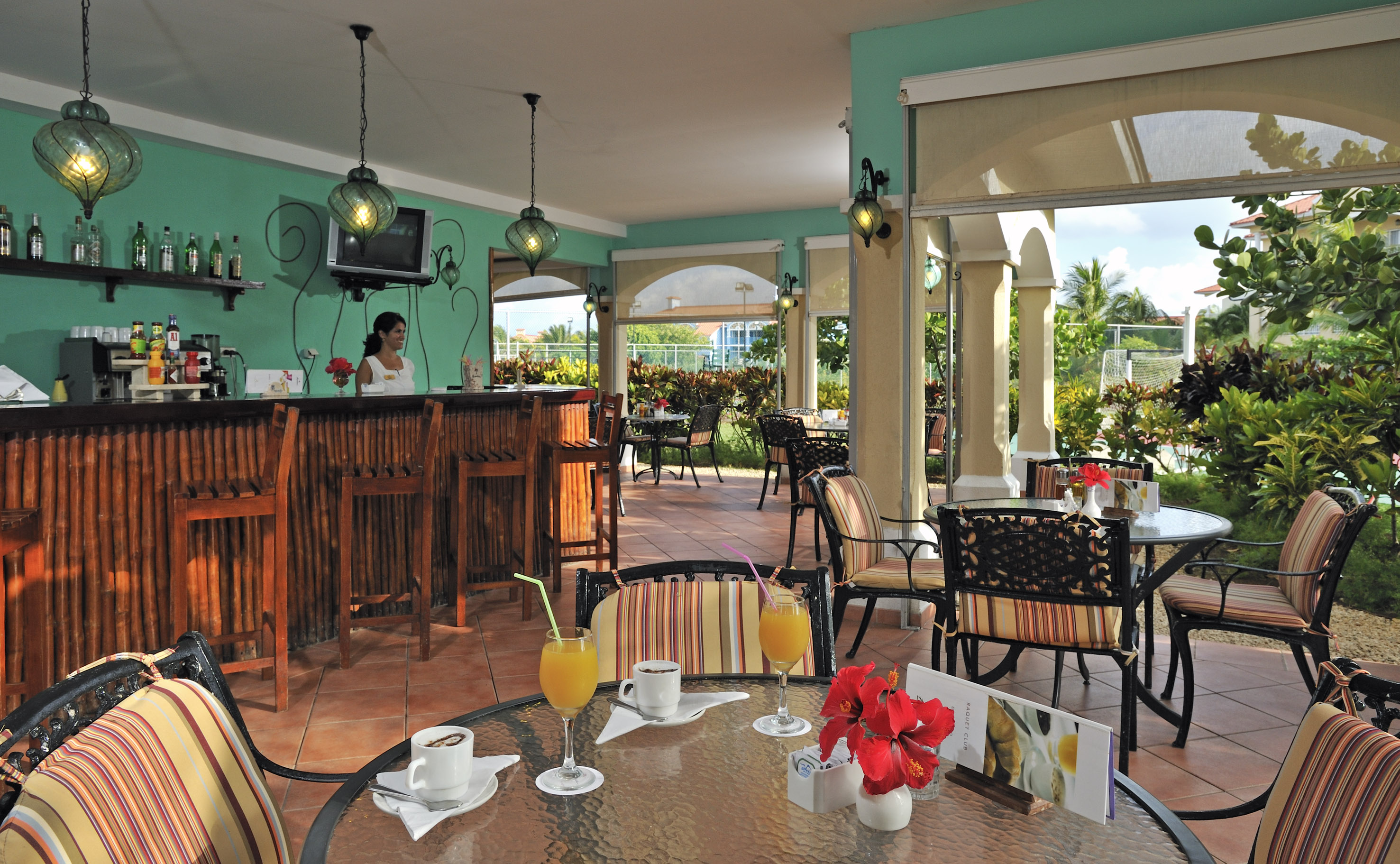a restaurant with tables and chairs