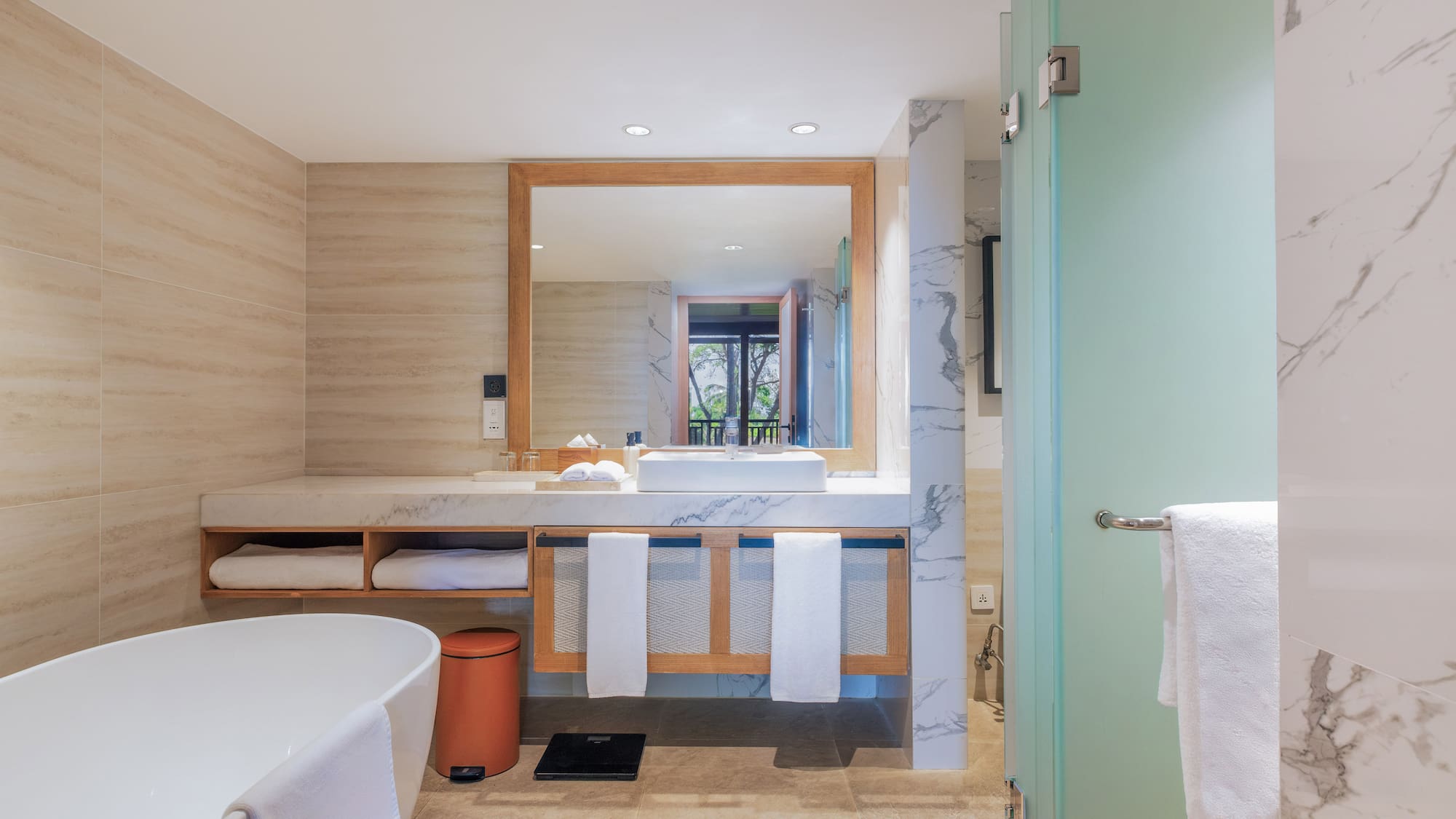 a bathroom with a mirror and sink