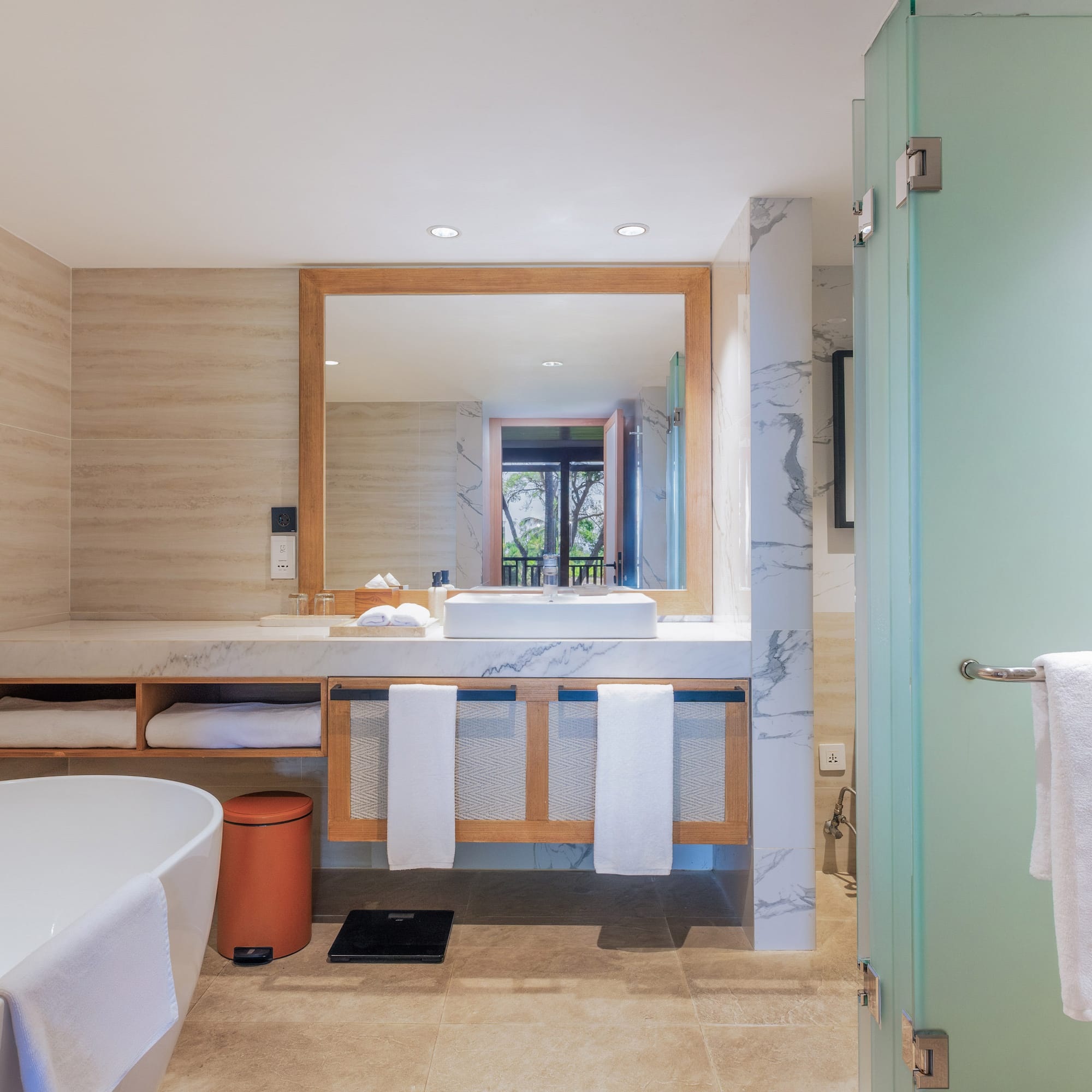 a bathroom with a mirror and sink