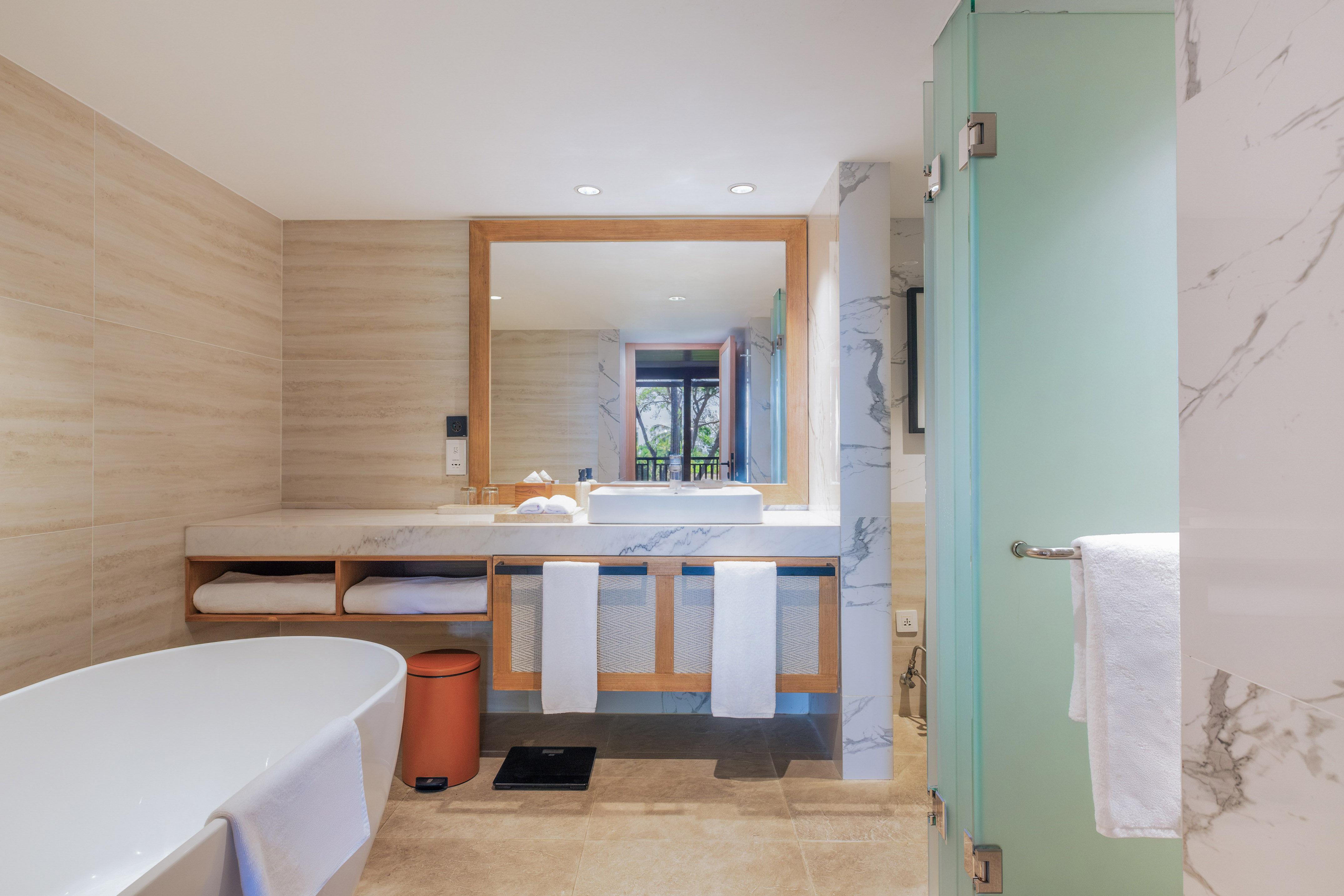 a bathroom with a mirror and sink