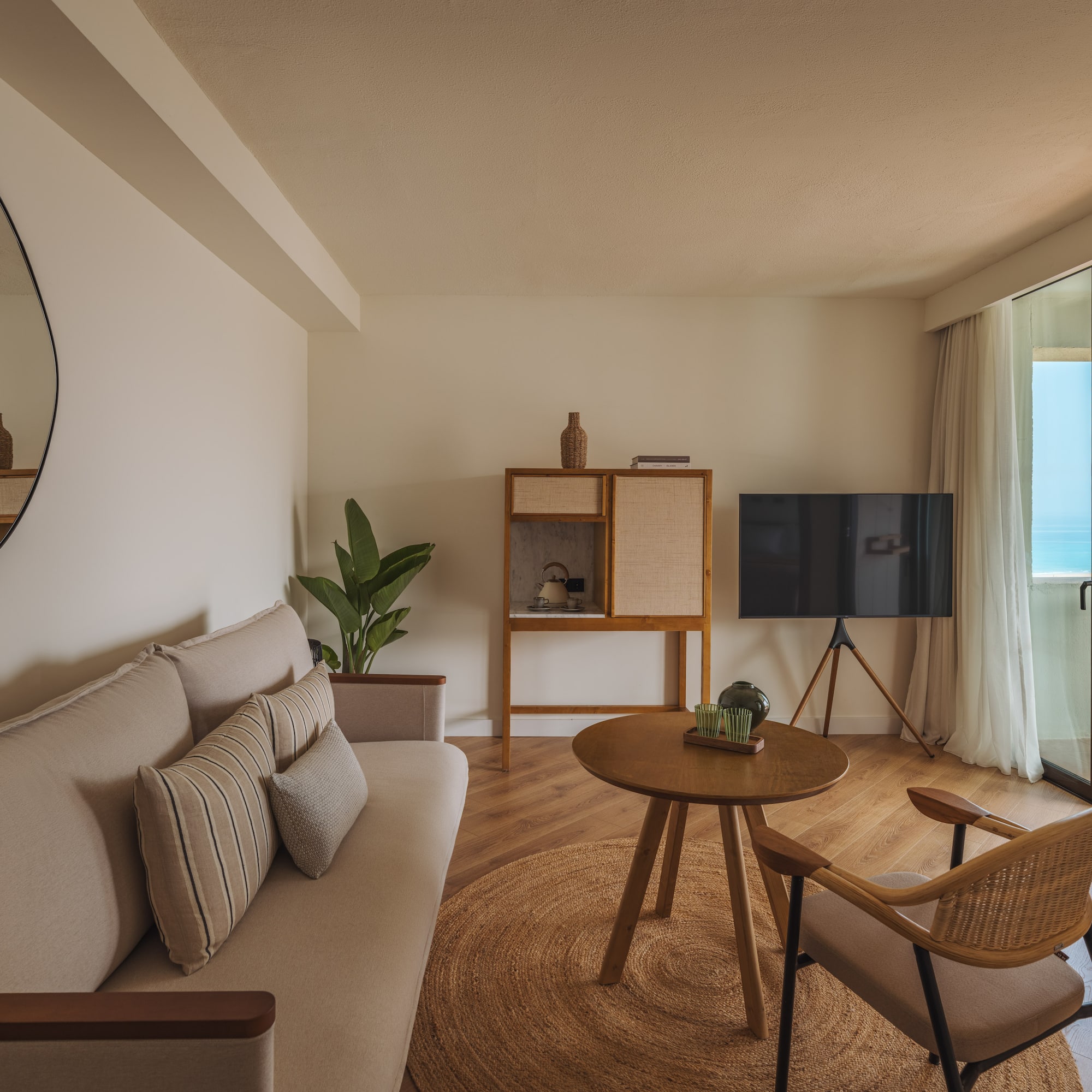 a living room with a couch and a table