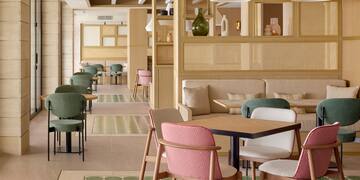 a room with tables and chairs