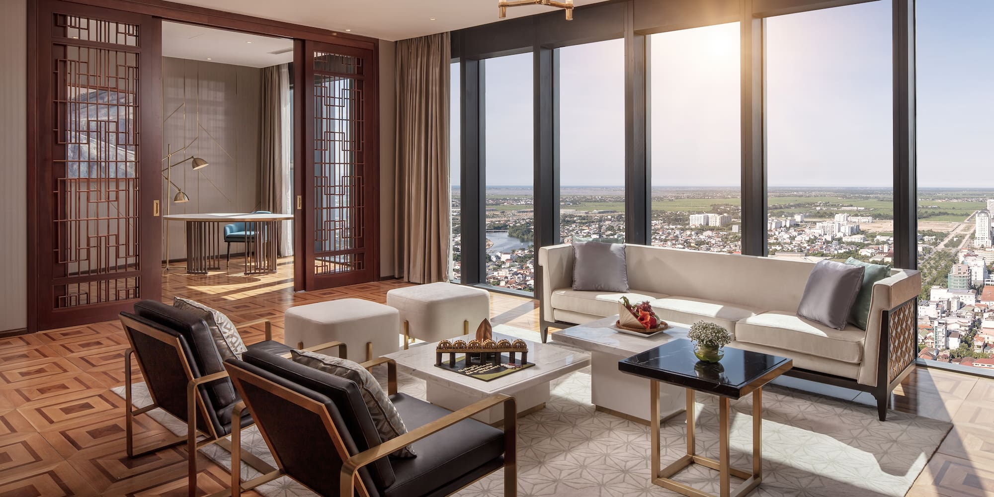 a room with a large window and a view of a city