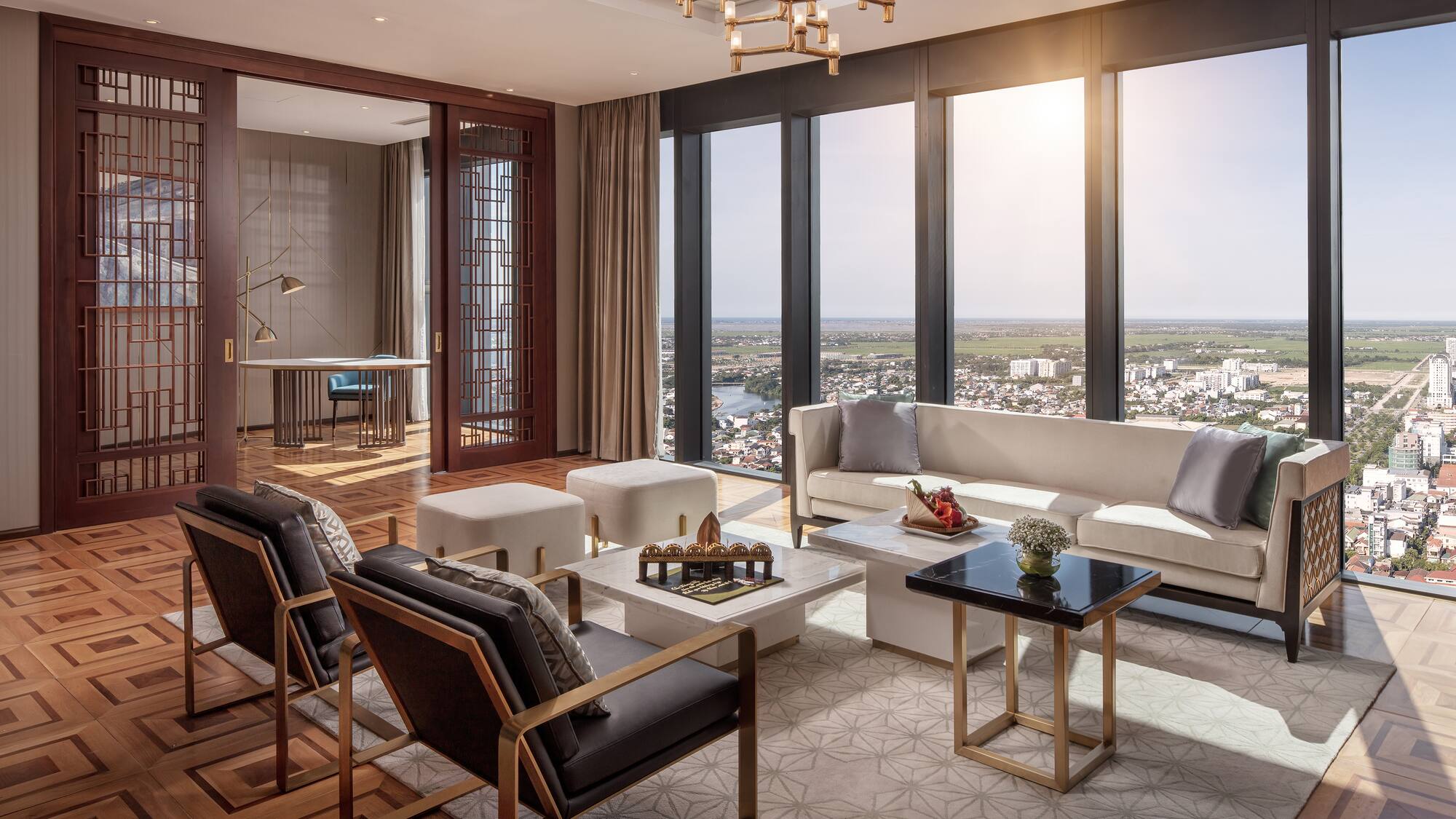 a room with a large window and a view of a city