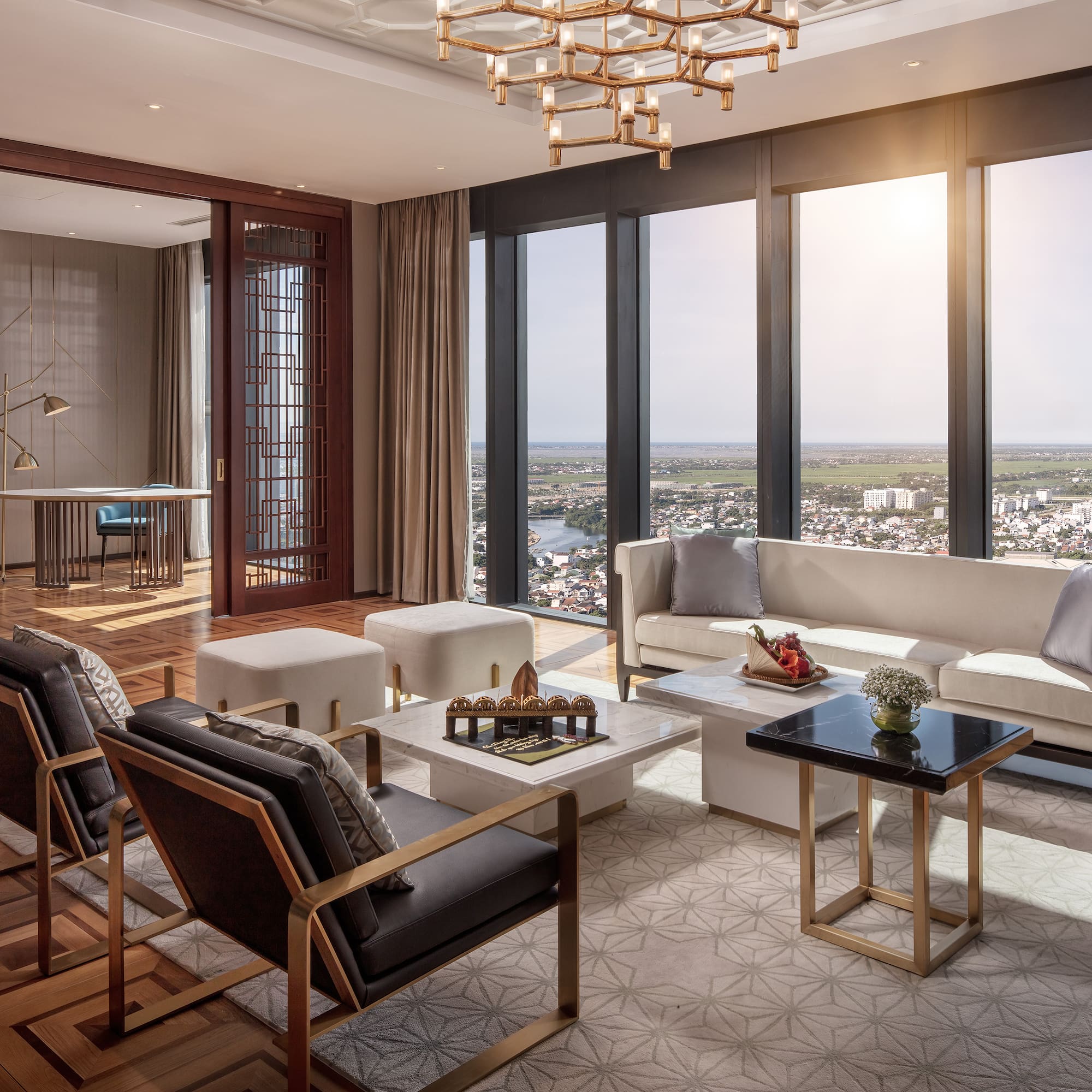 a room with a large window and a view of a city