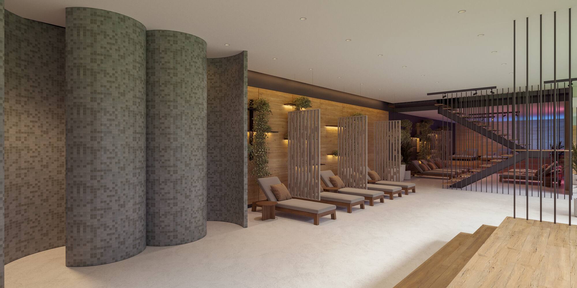 a room with a staircase and chairs