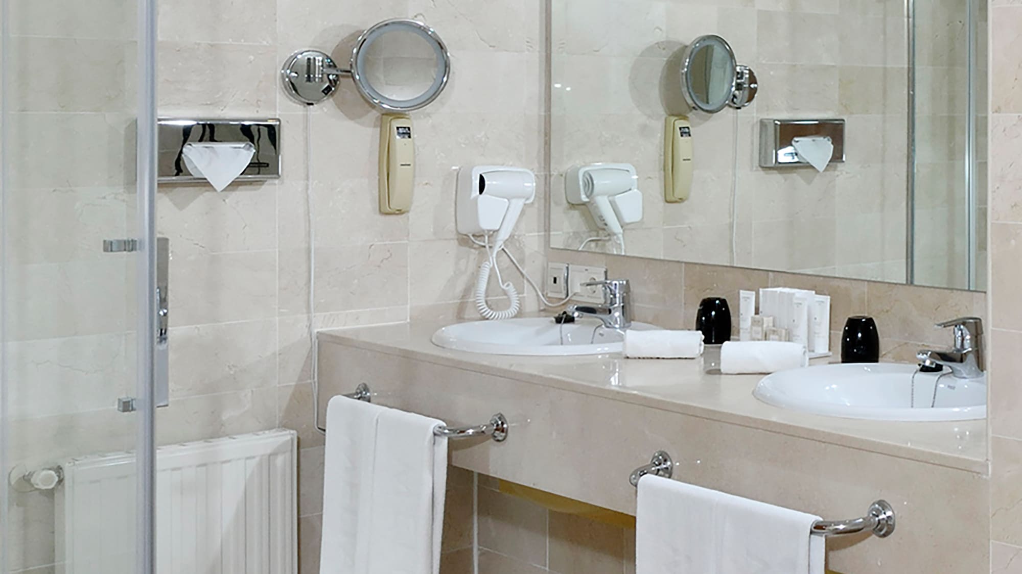 a bathroom with a shower and sink