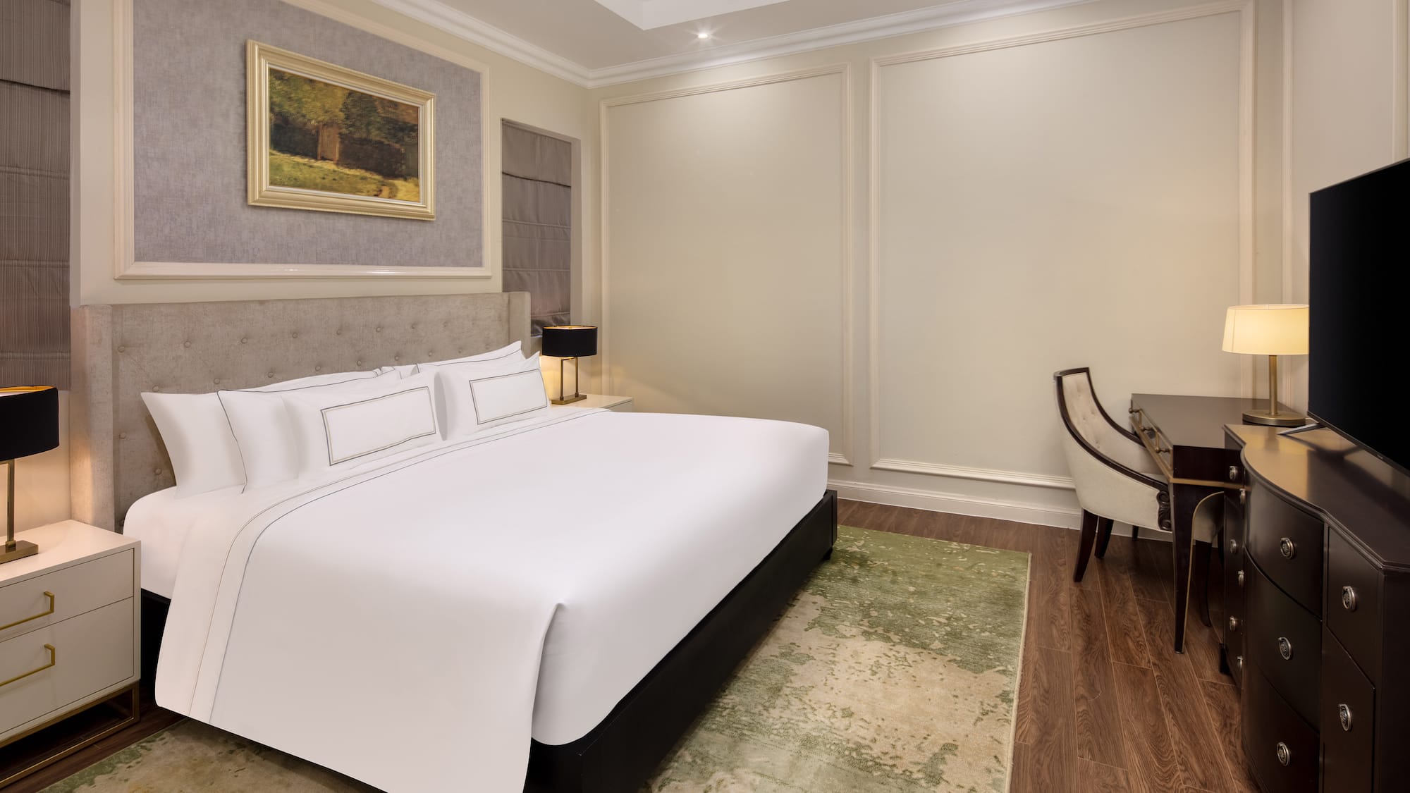 a bedroom with a bed and a desk