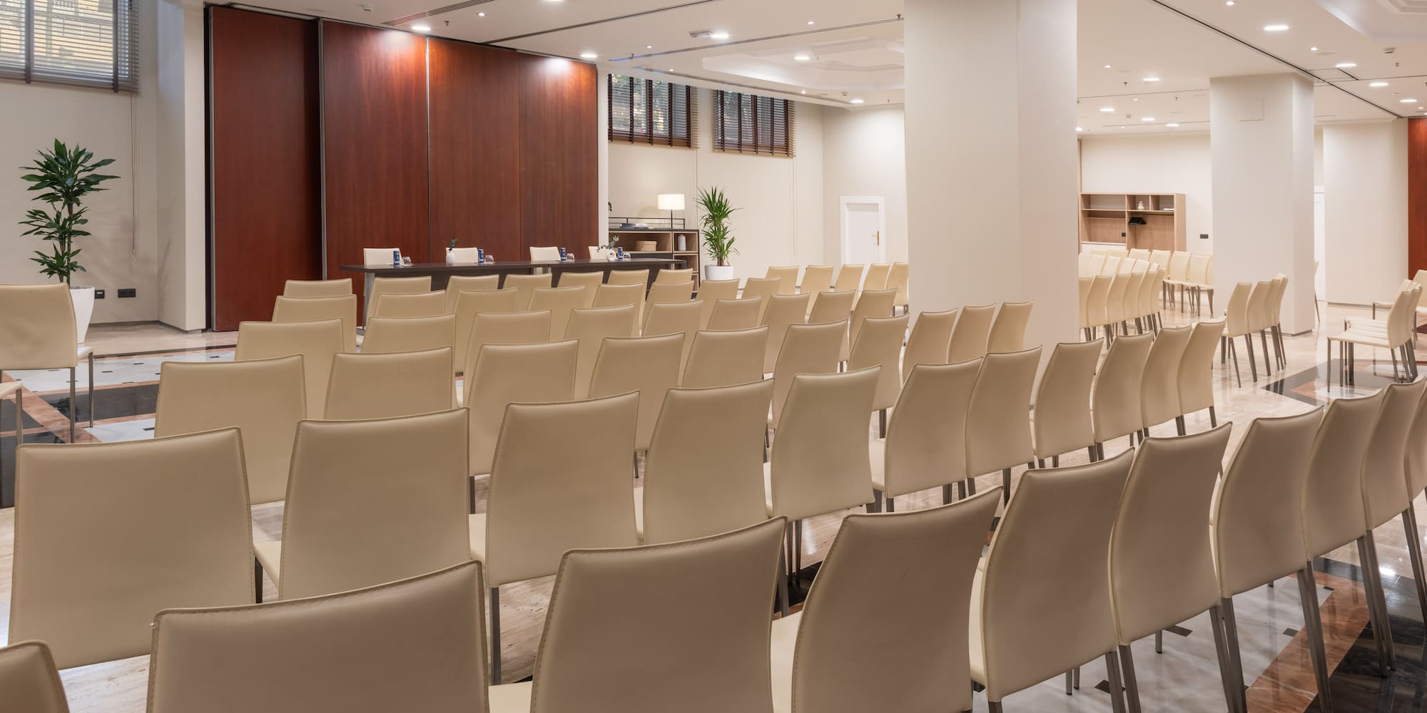 a room with rows of chairs
