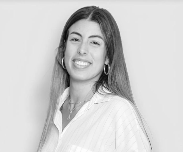 a woman smiling with long hair