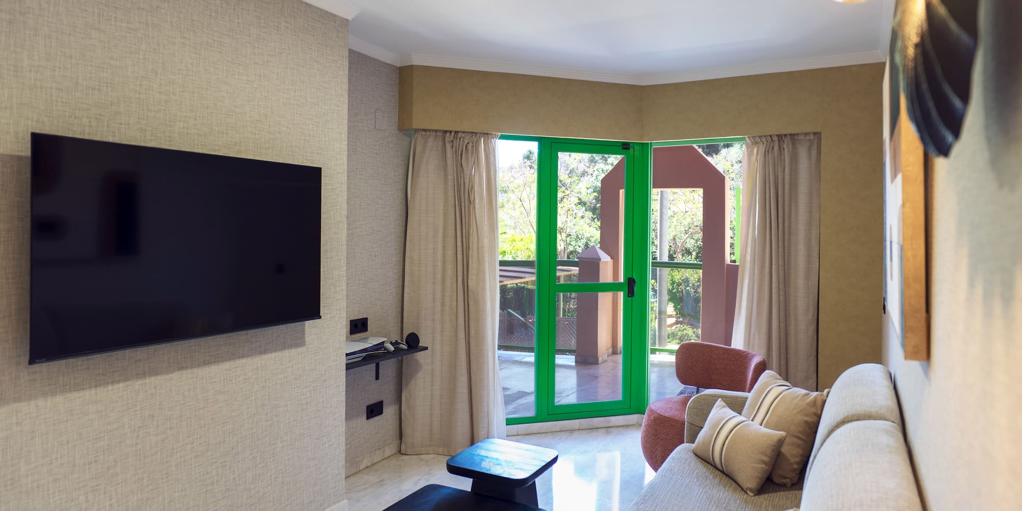 a living room with a television and a couch