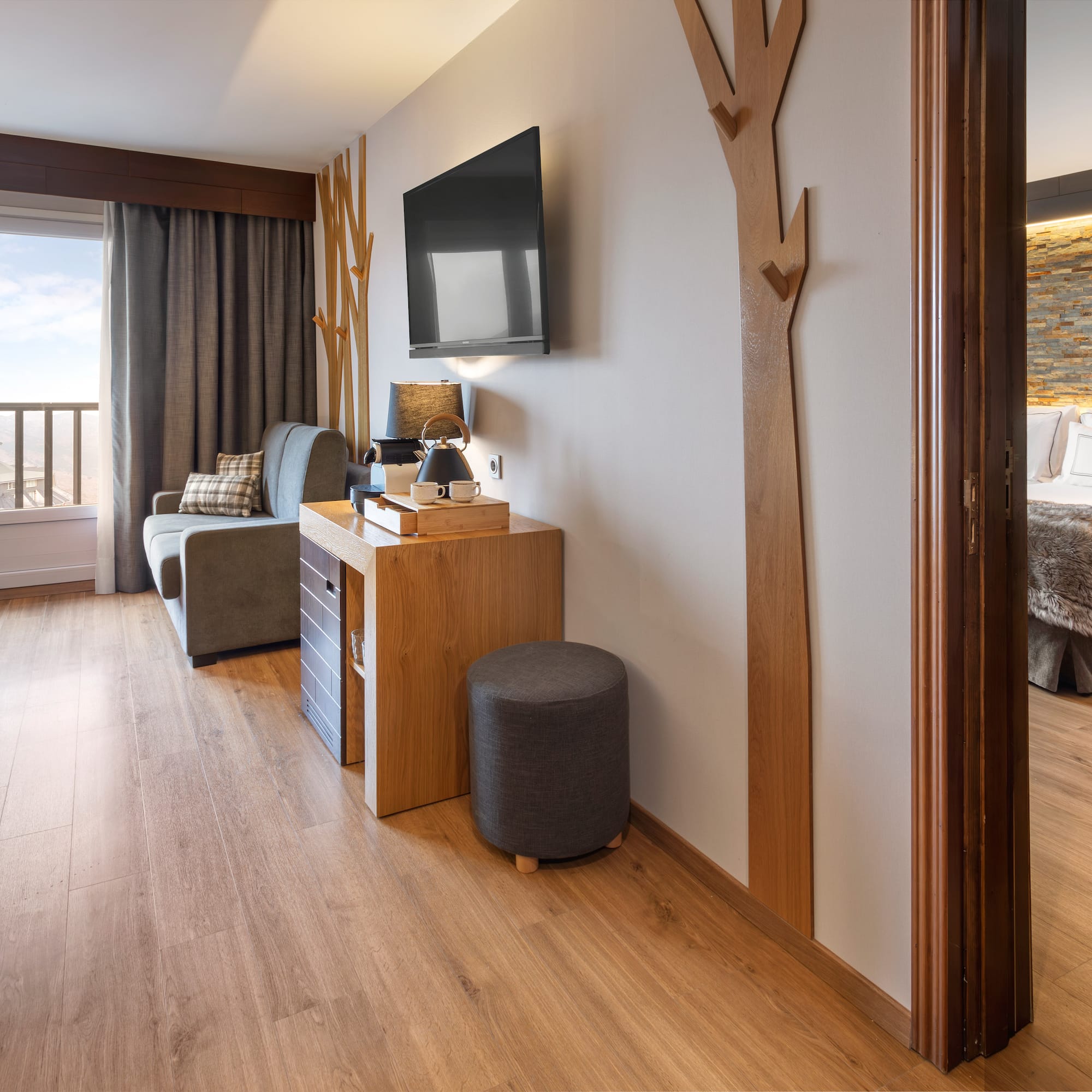 a room with a television and a couch