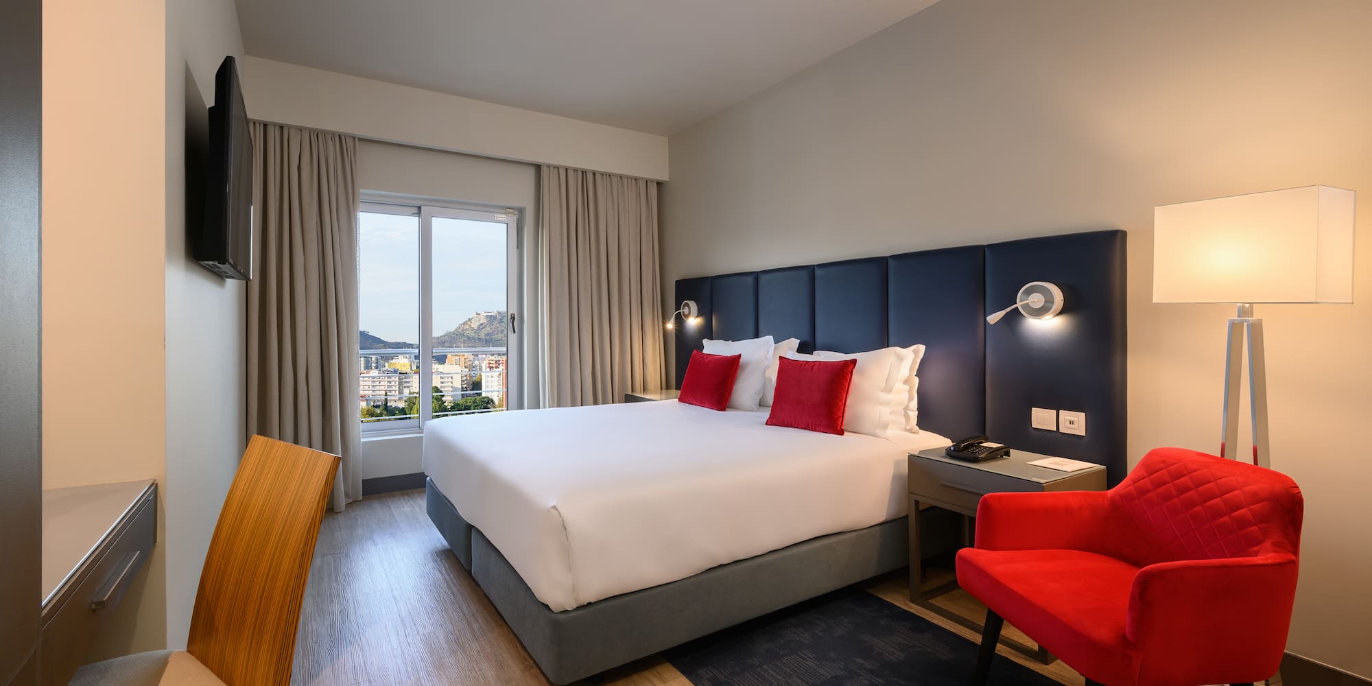 a room with a bed and a chair