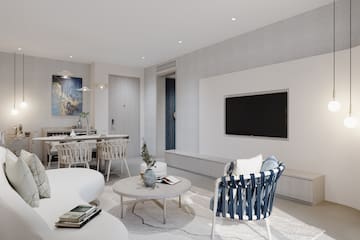 a living room with a tv and a table