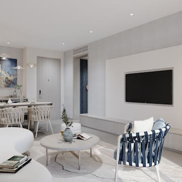 a living room with a tv and a table