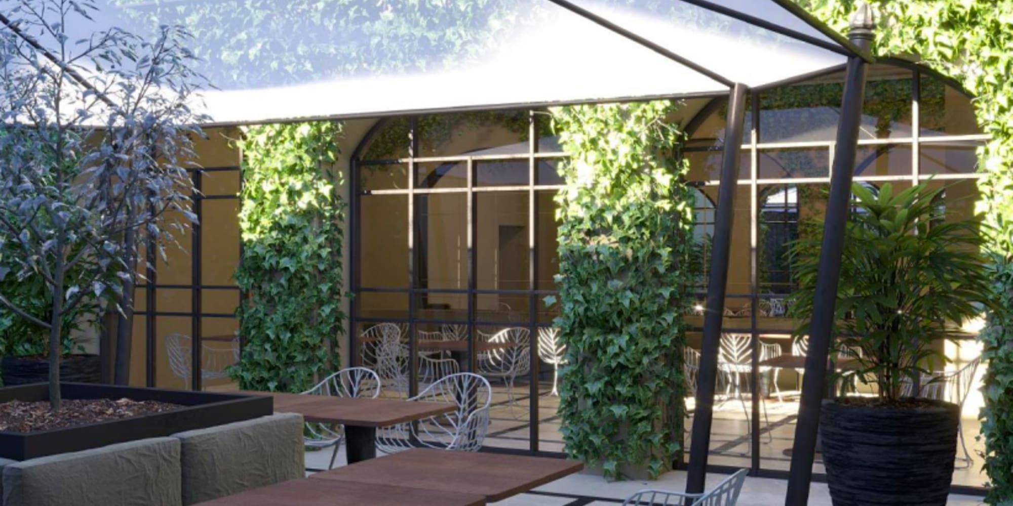 a patio with tables and chairs