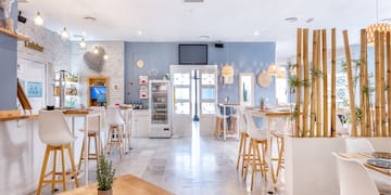 a room with tables and chairs