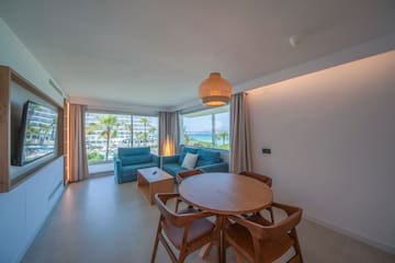 a room with a table and chairs