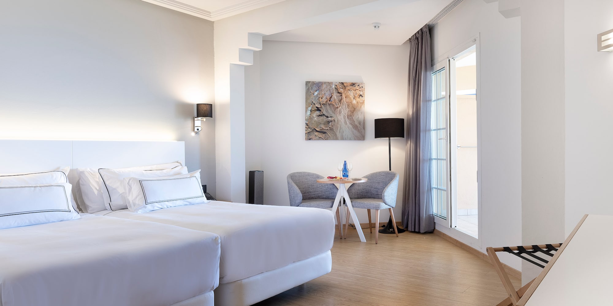 a room with a bed and a chair