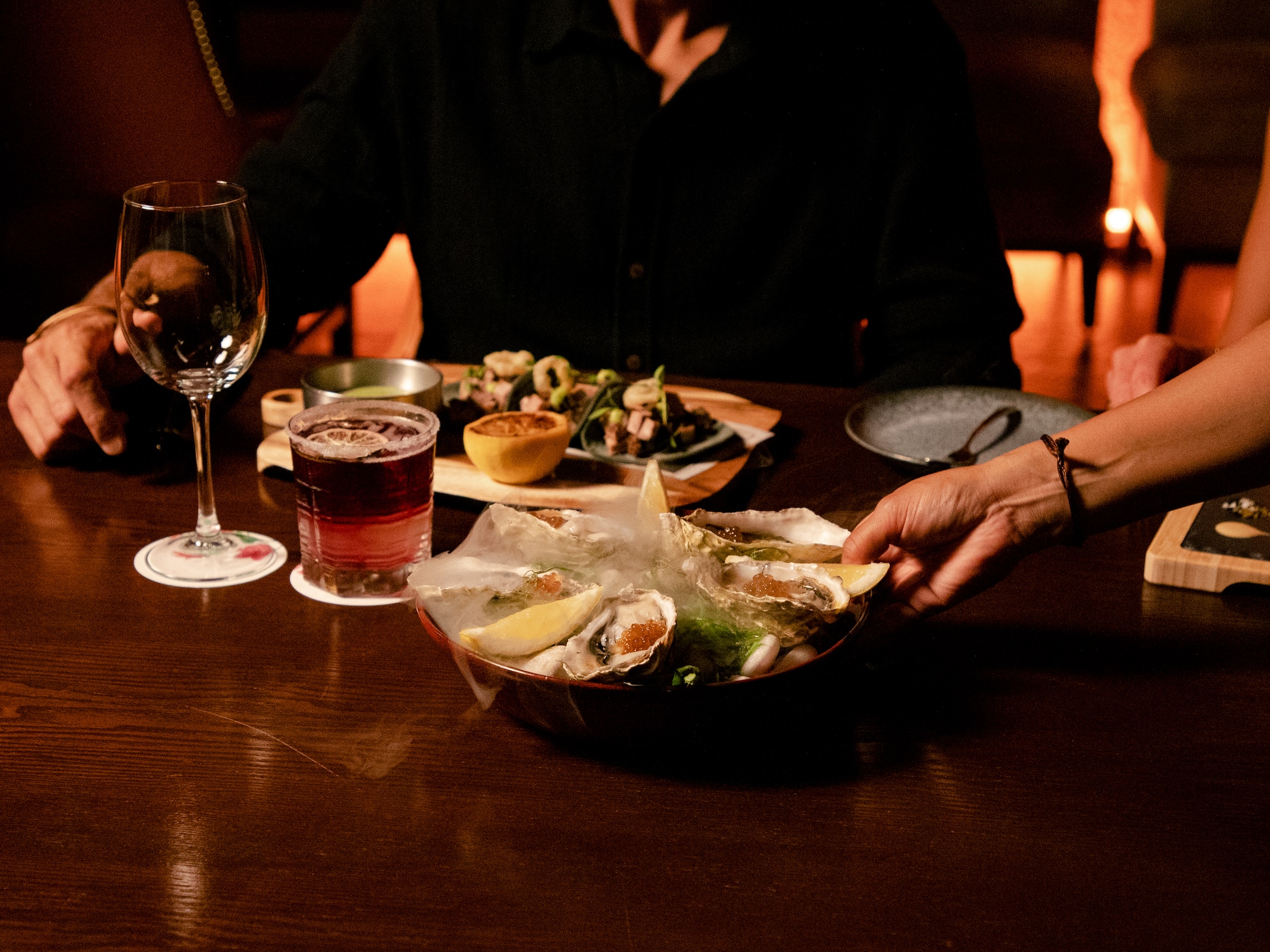 a person holding a plate of food
