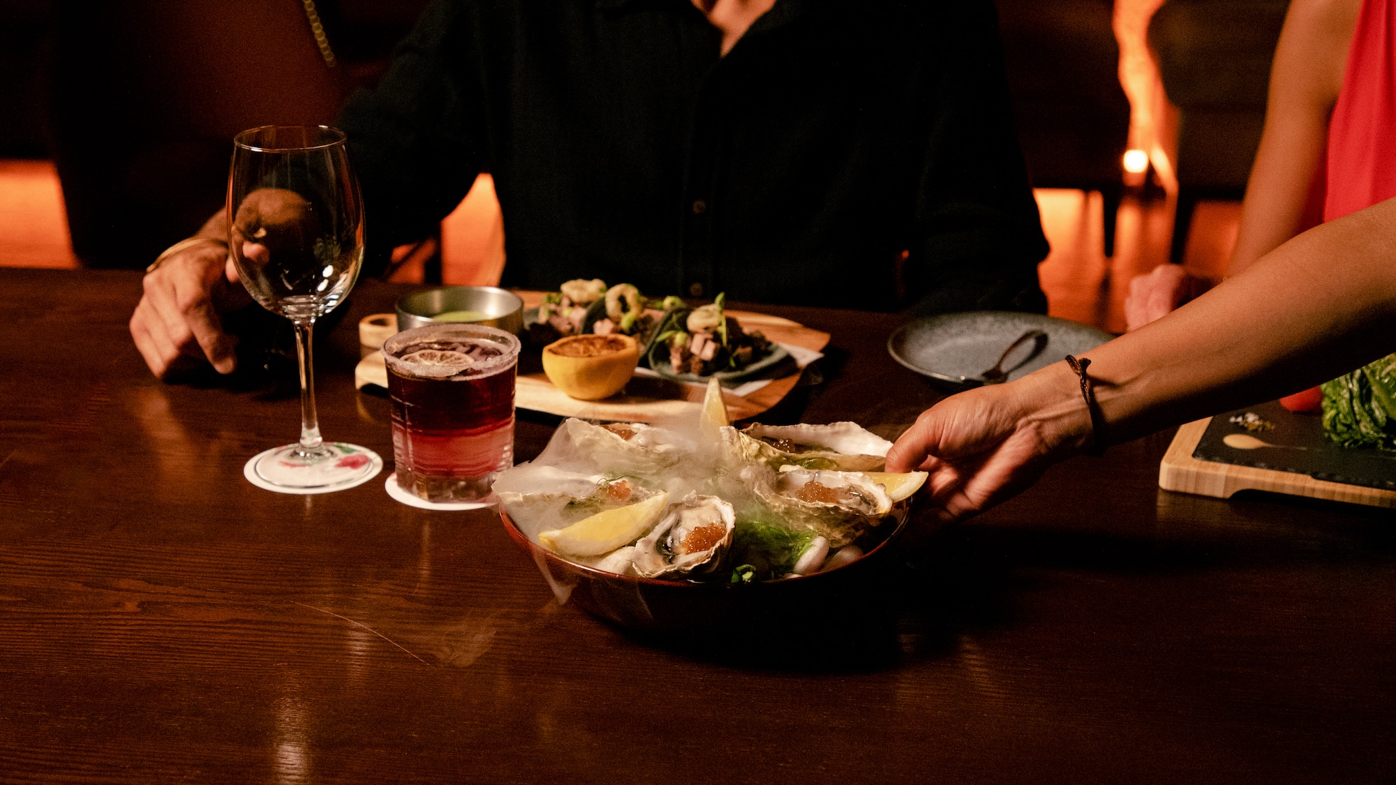 a person holding a plate of food