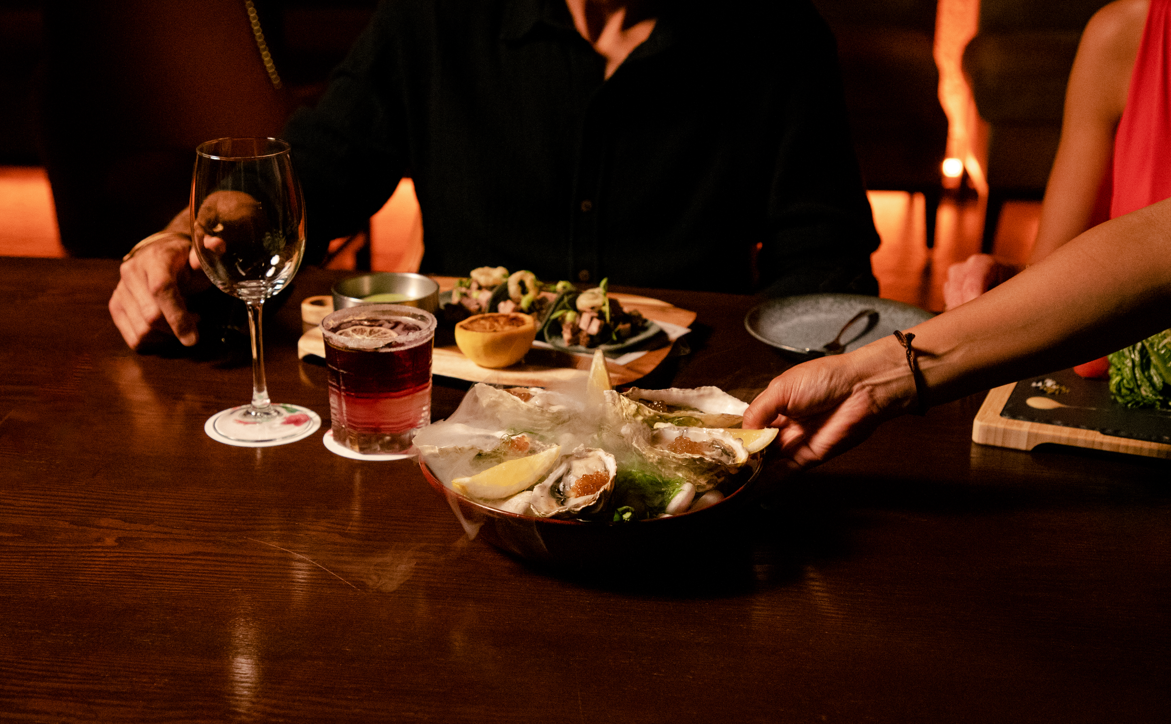 a person holding a plate of food