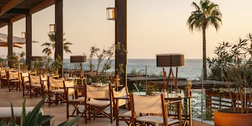 a restaurant with tables and chairs