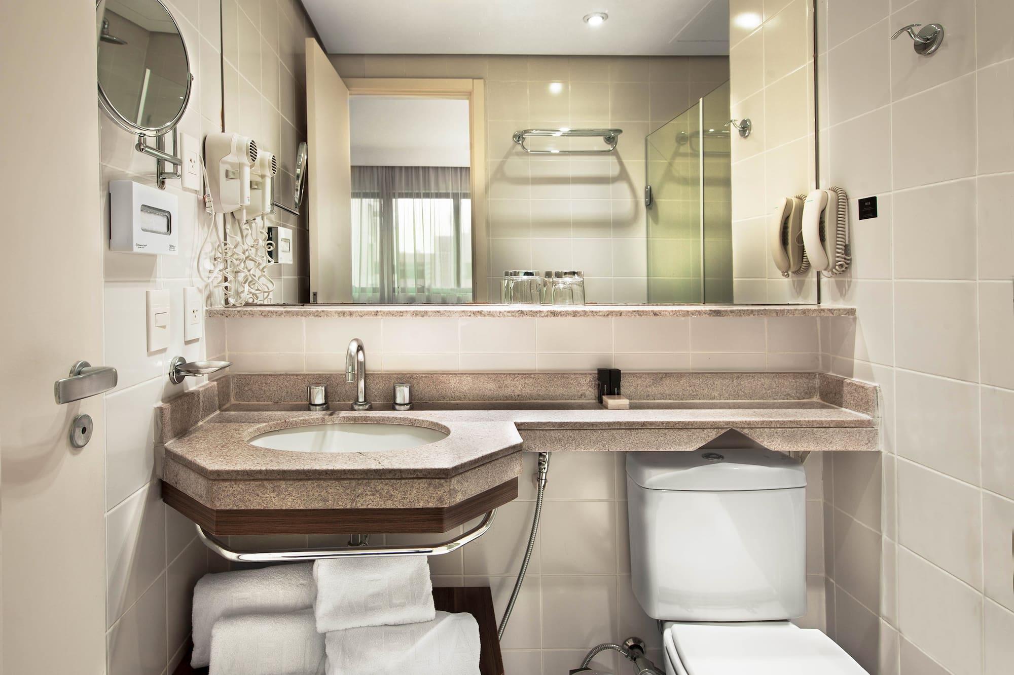 a bathroom with a sink and toilet