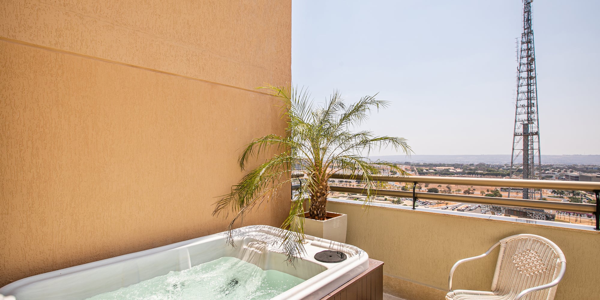 a hot tub on a balcony