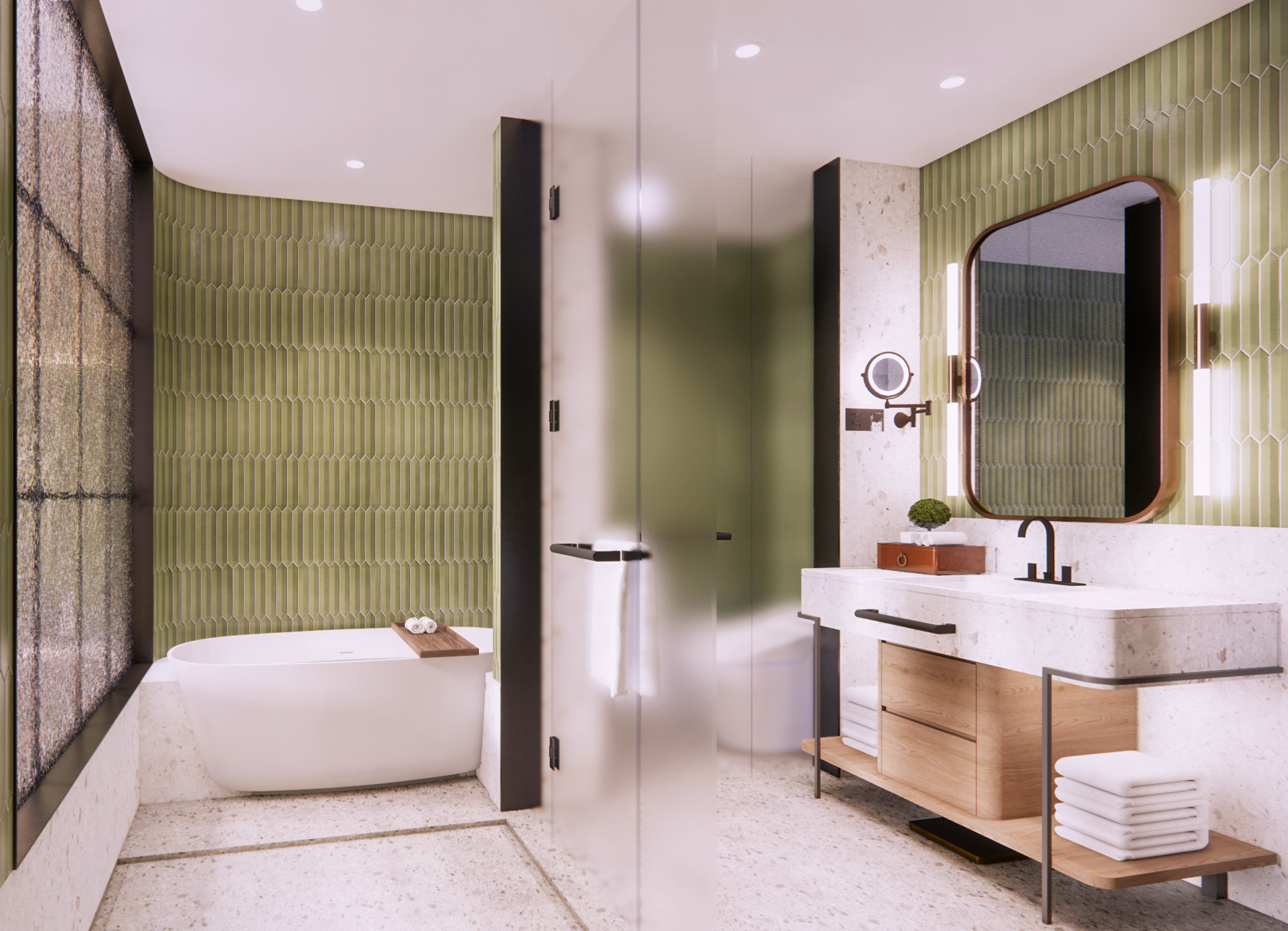 Modern bathroom with green picket tiles, freestanding tub, and glass shower.
