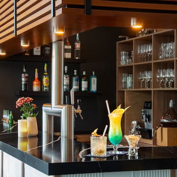 a bar with drinks on it